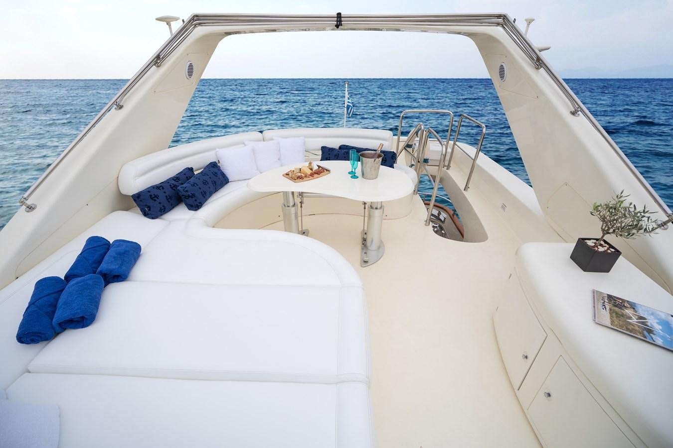 a boat with a table on it aboard ESTIA ZEUS Yacht for Sale