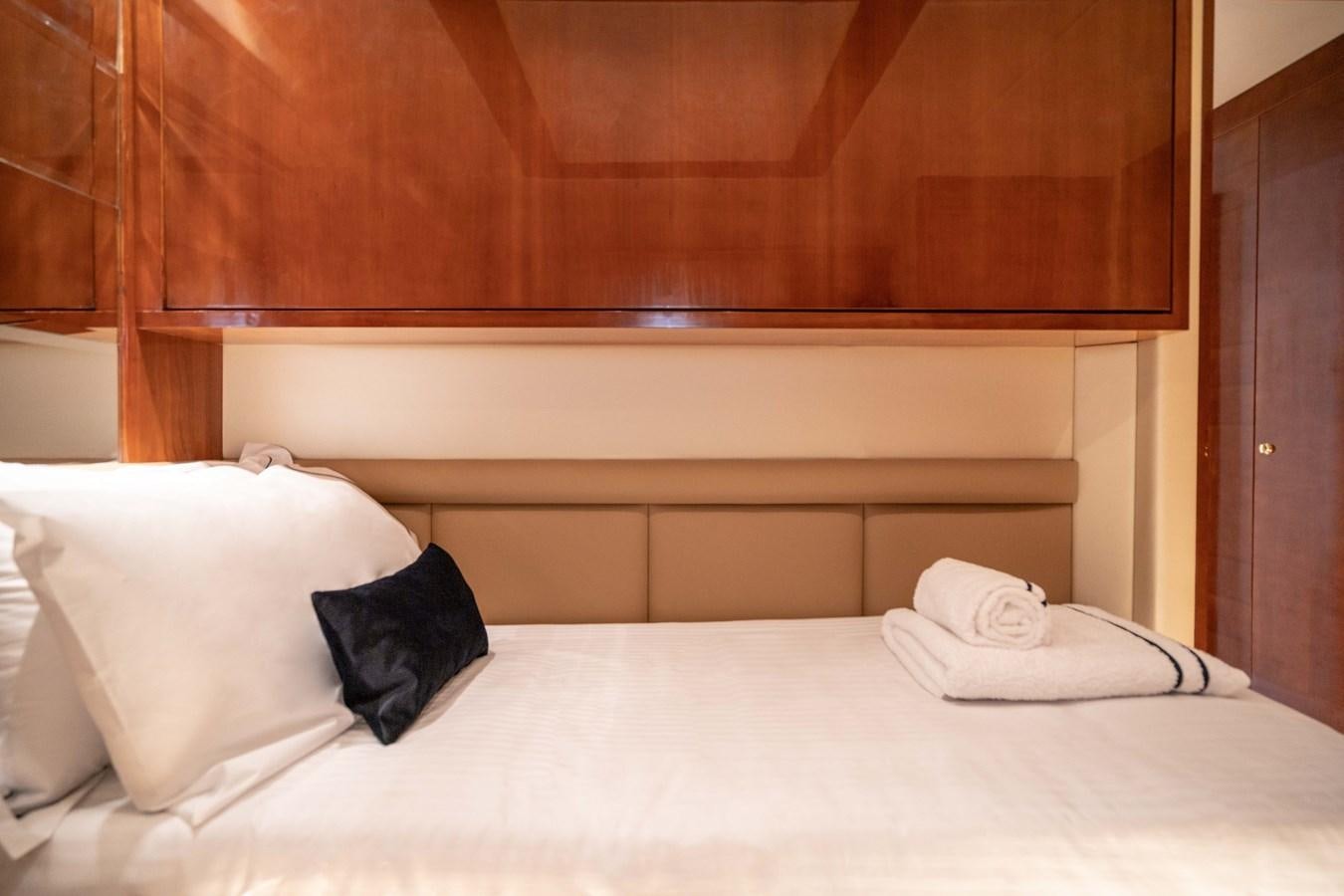 a bed with pillows aboard ESTIA ZEUS Yacht for Sale