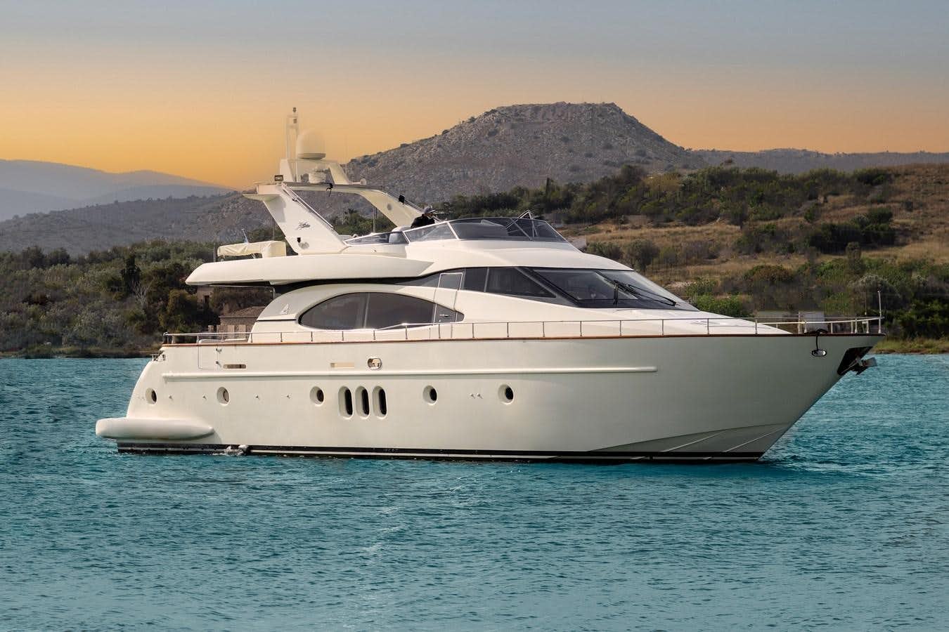 a white yacht on the water aboard ESTIA ZEUS Yacht for Sale