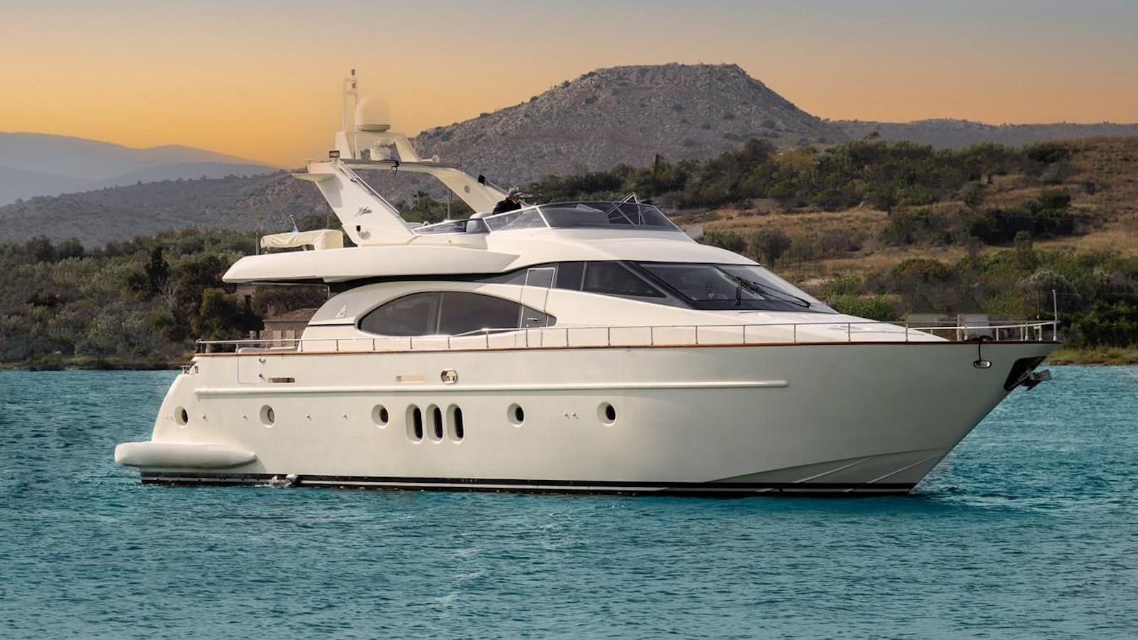 a white yacht on the water aboard ESTIA ZEUS Yacht for Sale