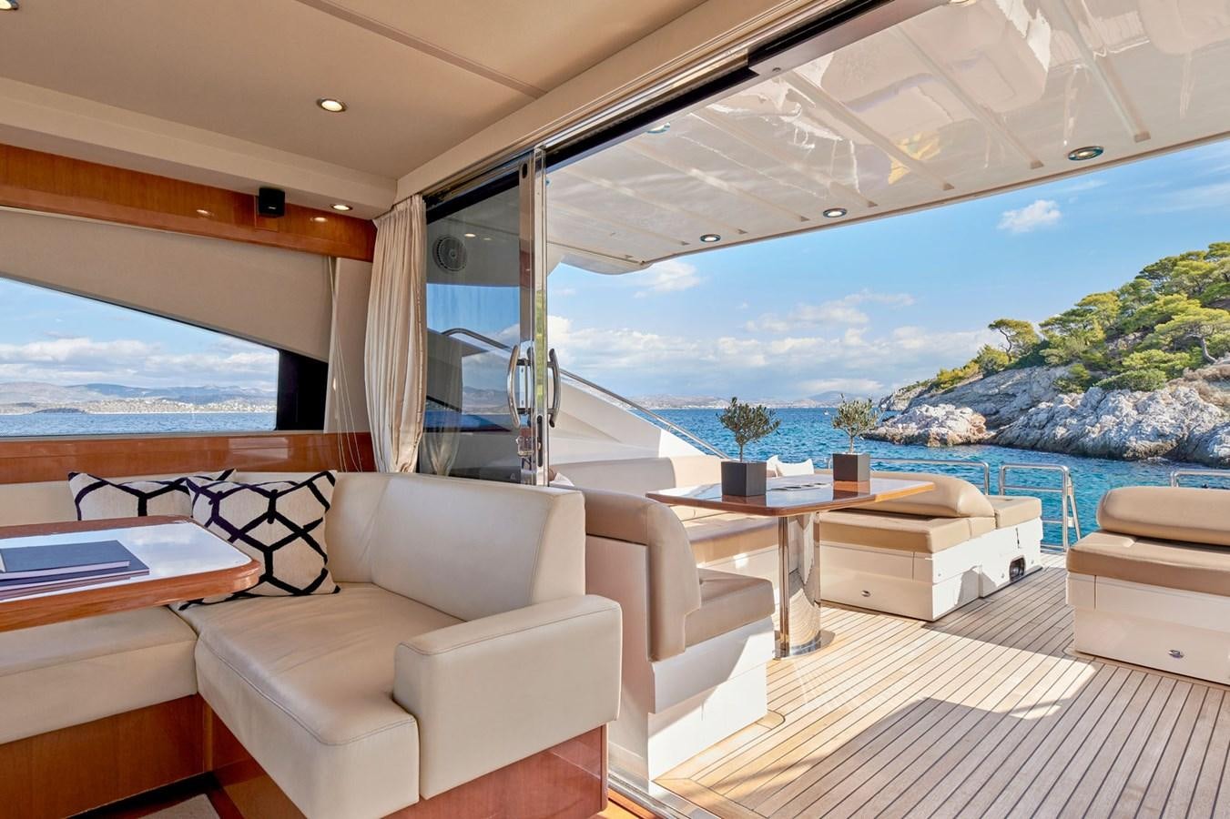 a room with a view of the ocean and a large window aboard ESTIA ONE Yacht for Sale