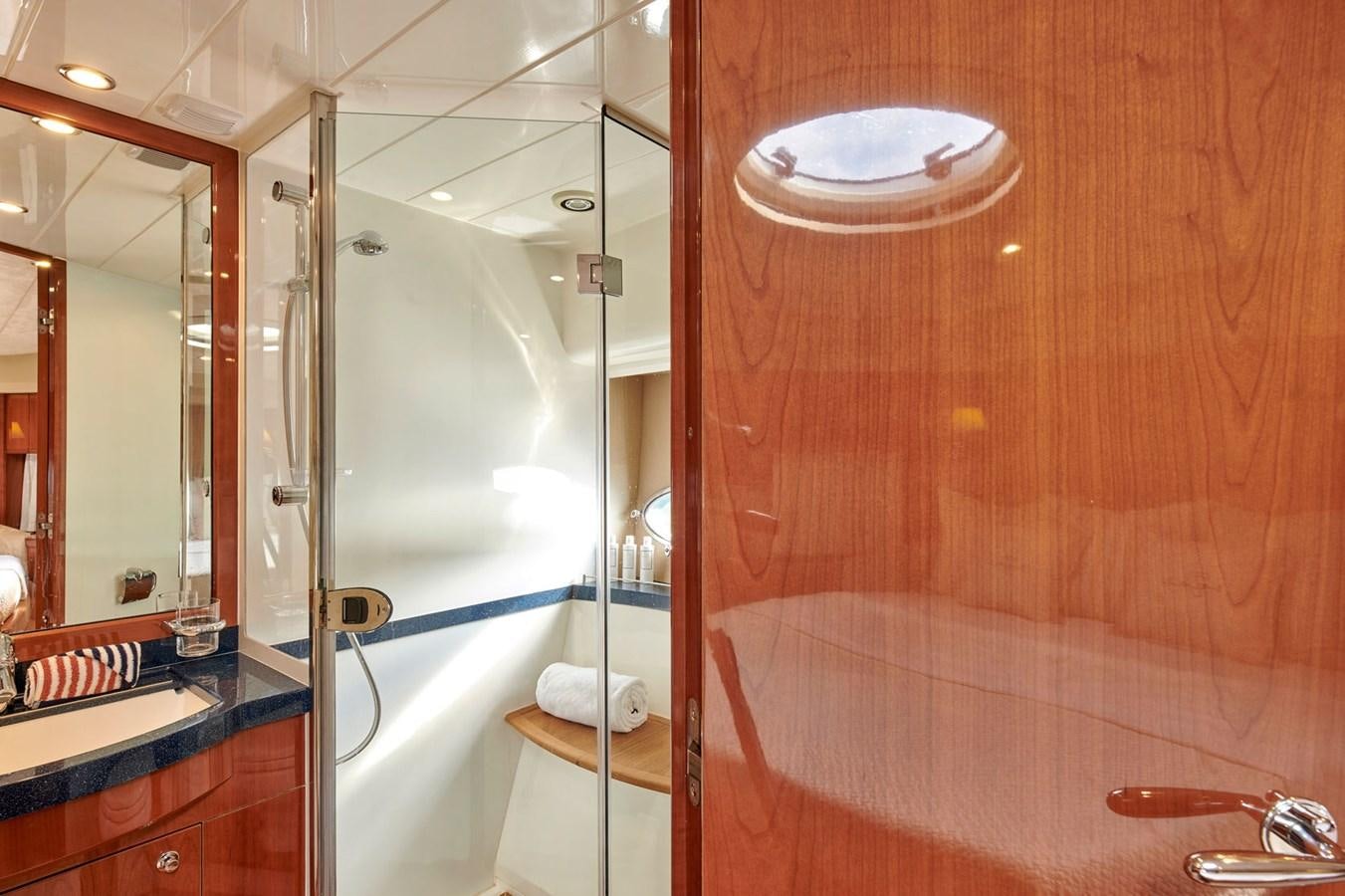 a bathroom with a glass shower aboard ESTIA ONE Yacht for Sale
