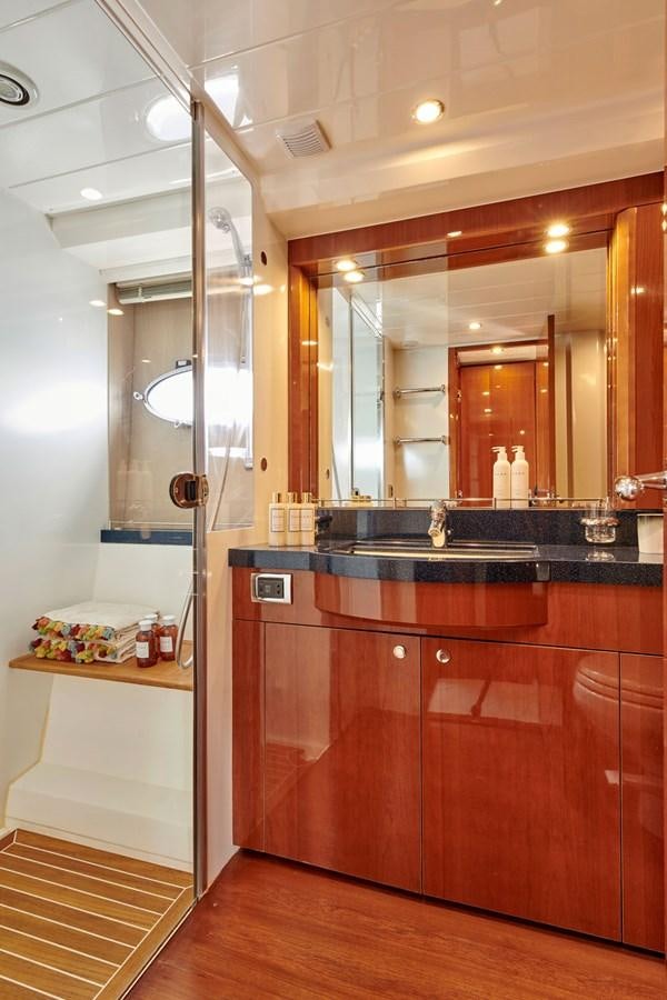 a bathroom with a large mirror aboard ESTIA ONE Yacht for Sale