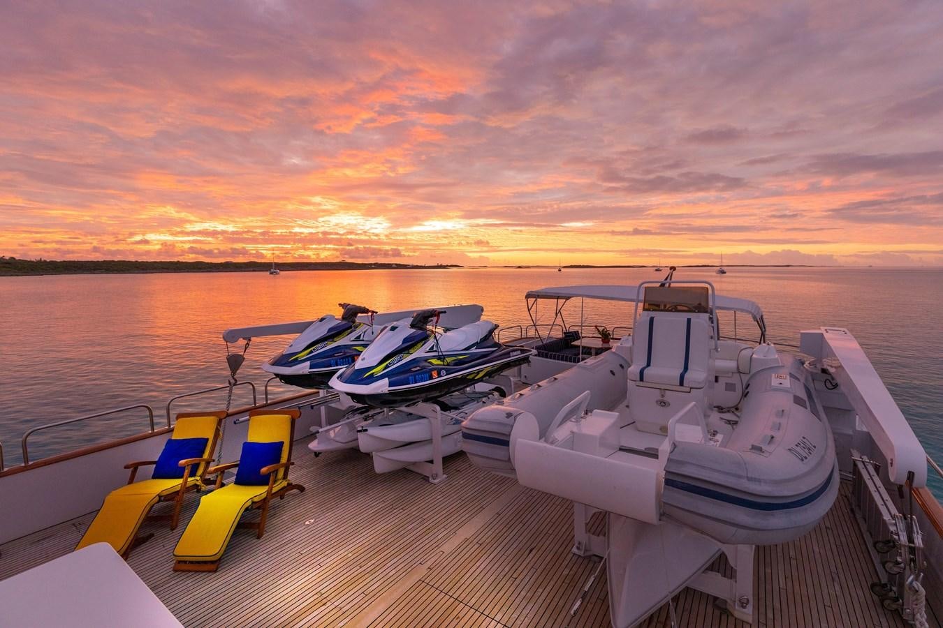 a boat dock with boats aboard RENA Yacht for Sale