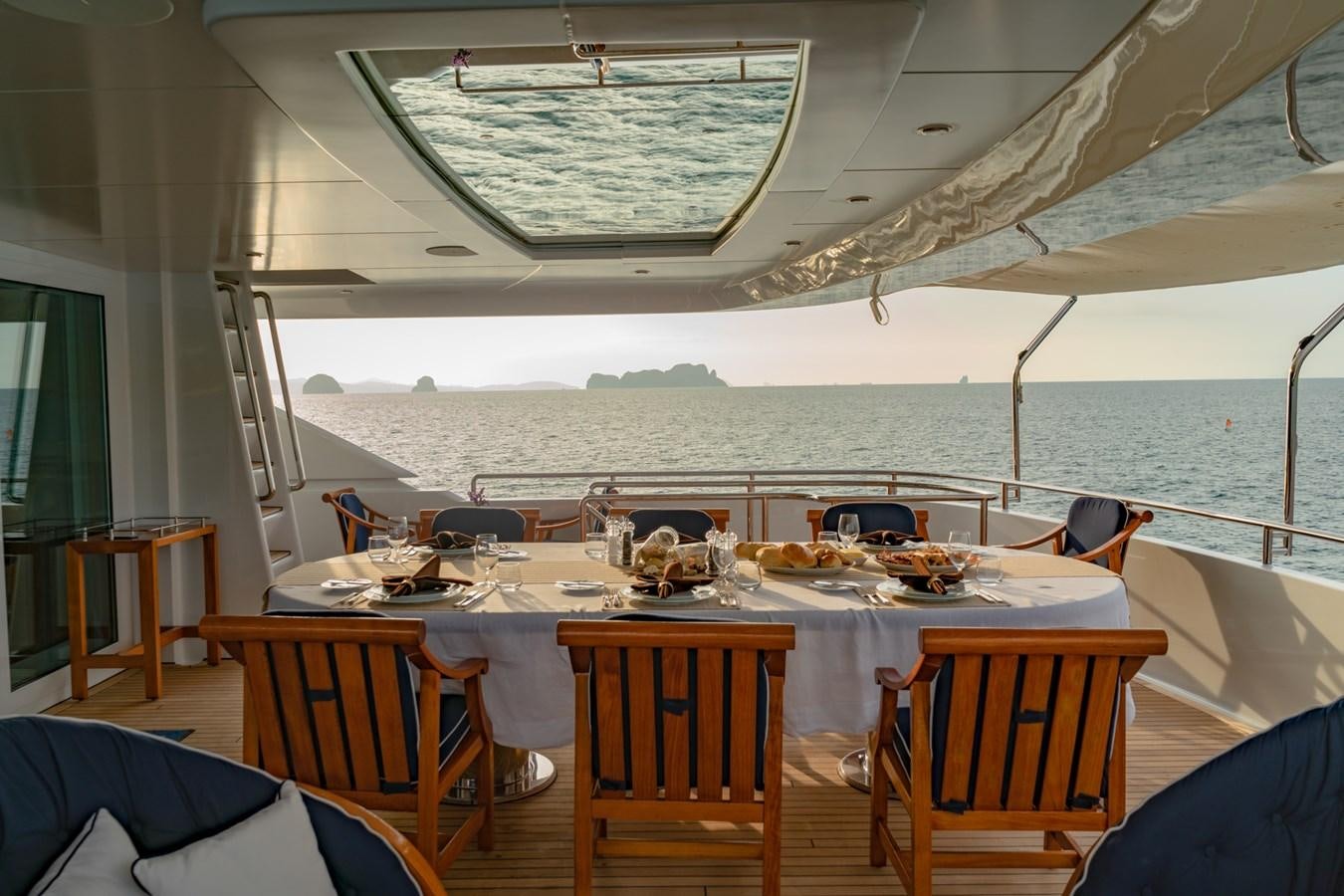 a dining table on a boat aboard LADY AZUL Yacht for Sale