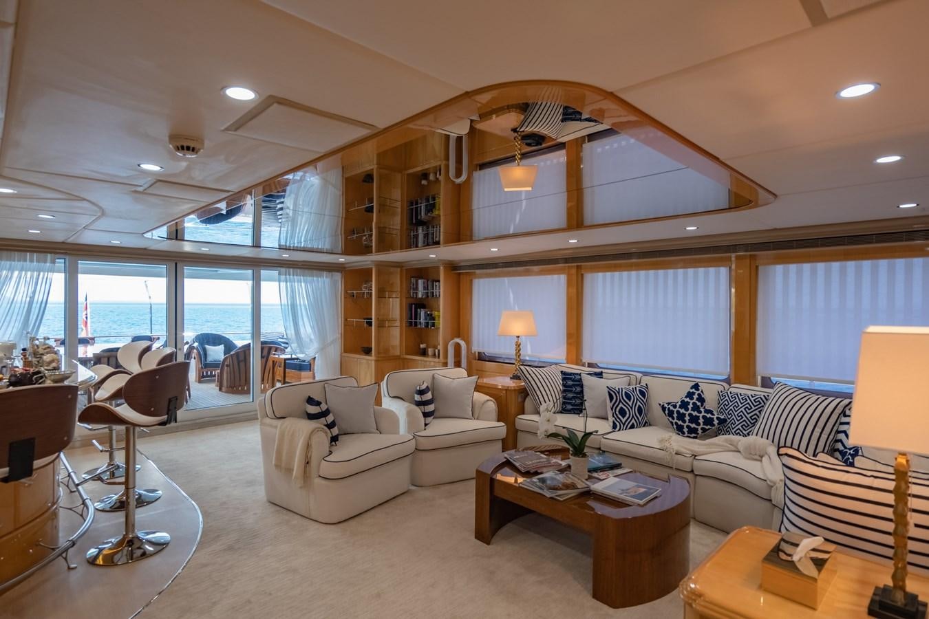 a living room with a large window aboard LADY AZUL Yacht for Sale