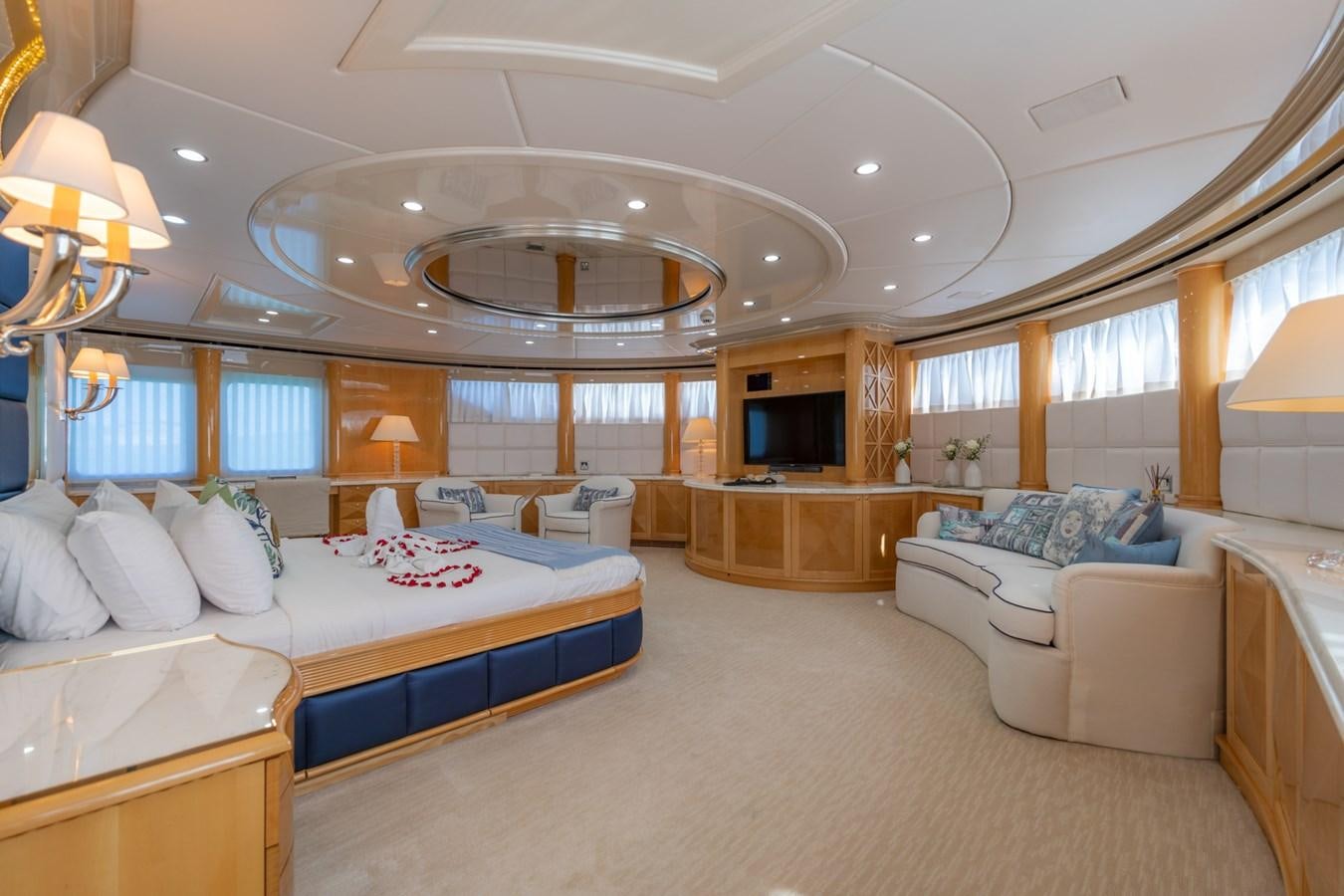 a large bedroom with a large bed aboard LADY AZUL Yacht for Sale