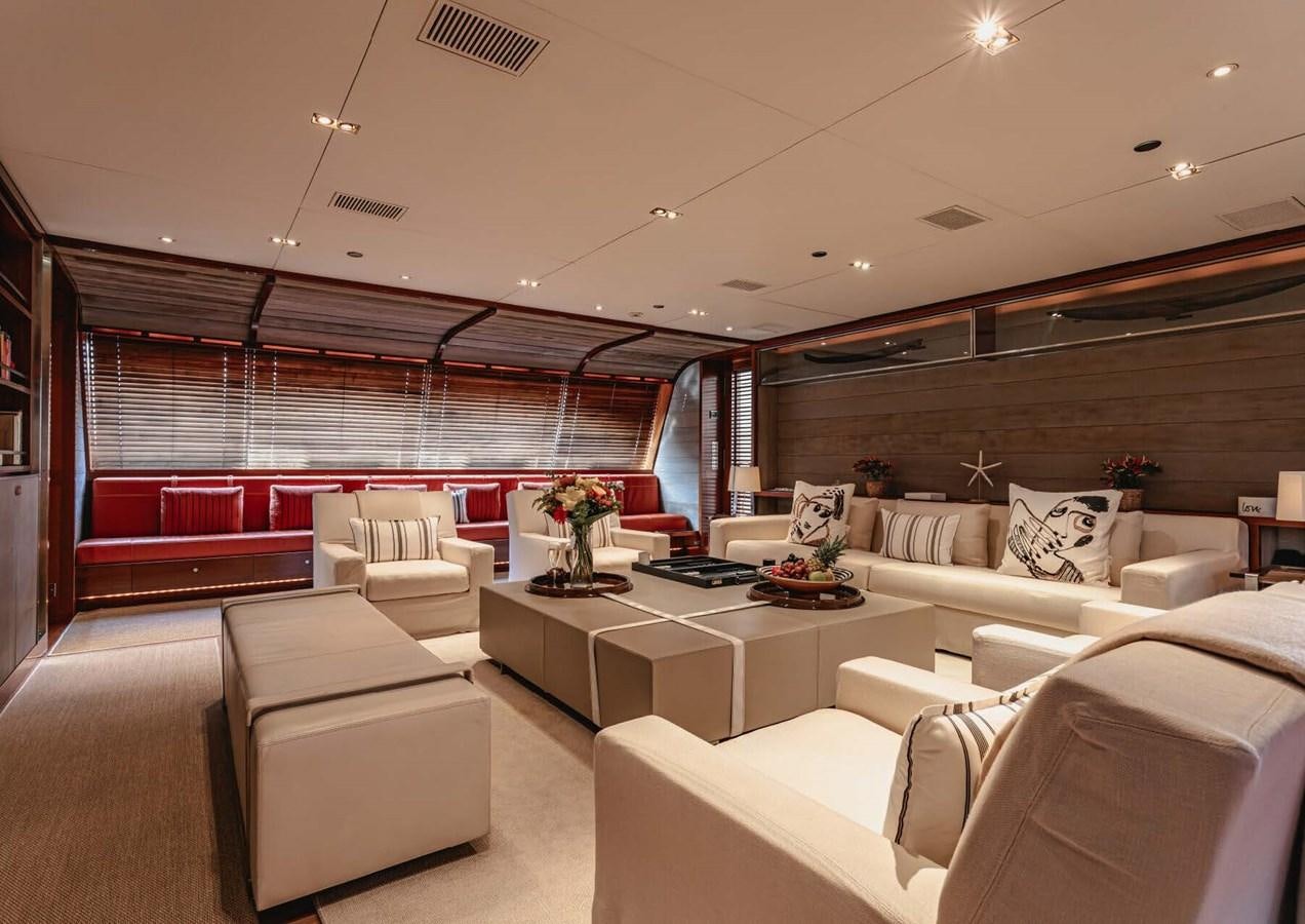 a room with couches and a table aboard ROSEHEARTY Yacht for Sale