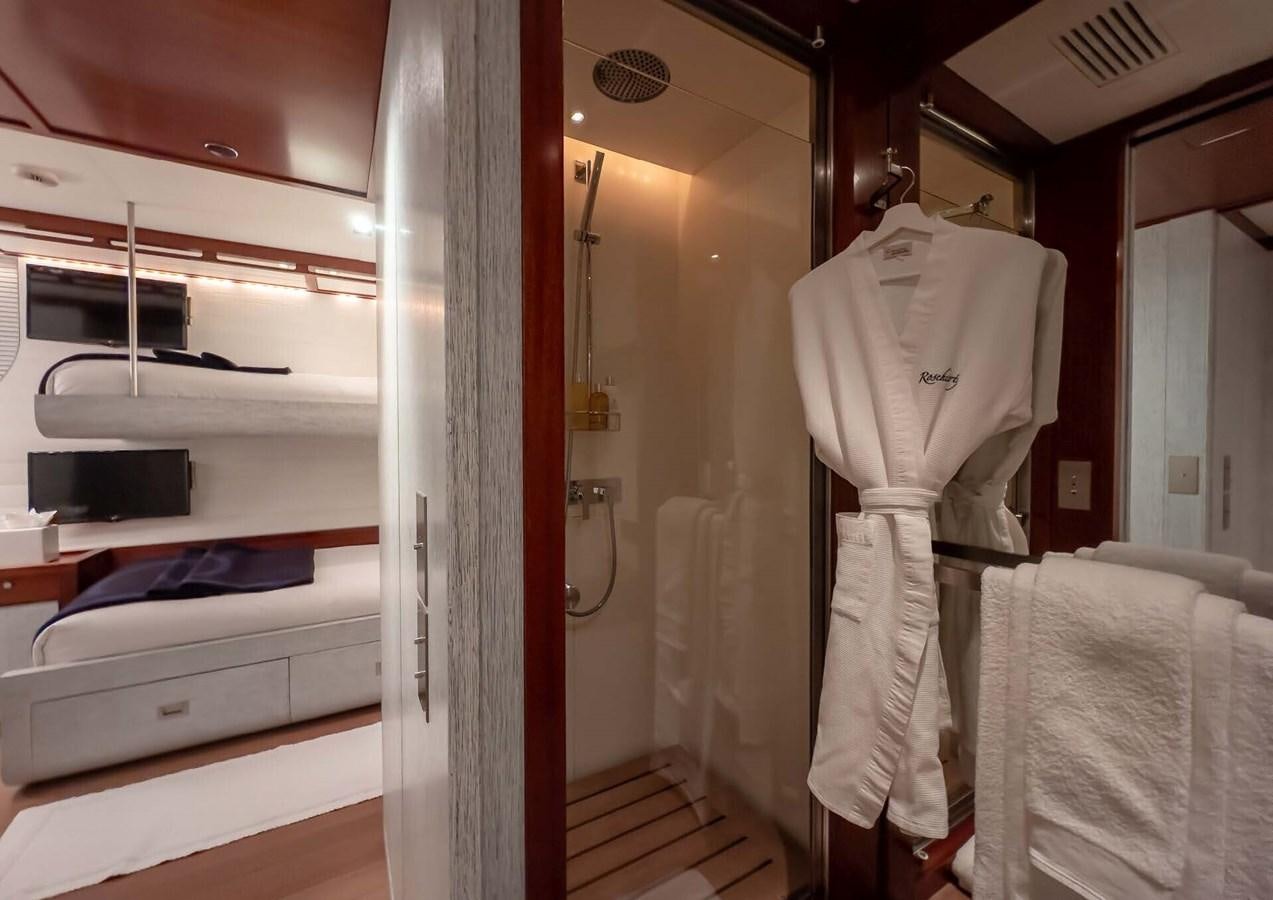 a room with a closet and a bed aboard ROSEHEARTY Yacht for Sale