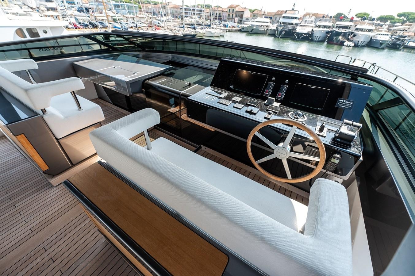 a boat with a steering wheel aboard VISSOTTA Yacht for Sale