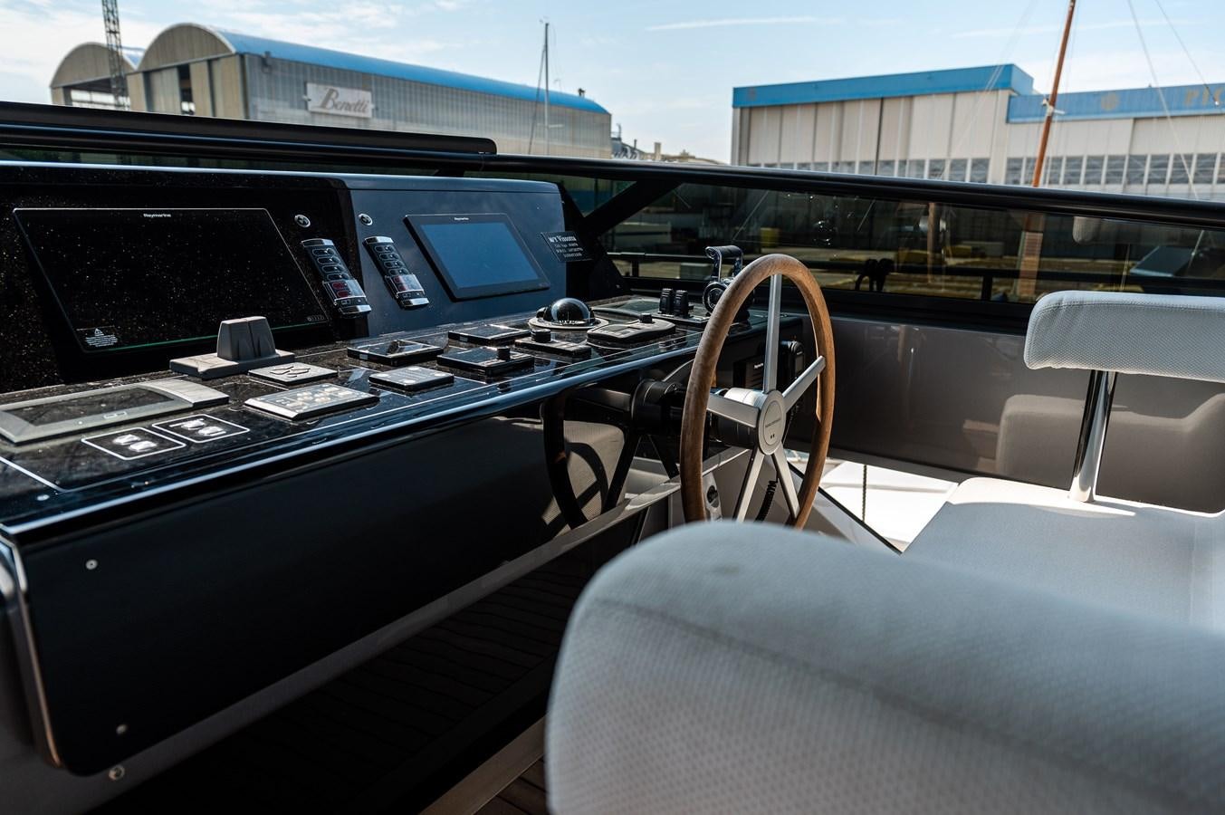 inside of a car aboard VISSOTTA Yacht for Sale