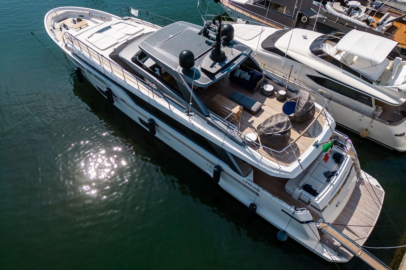 a large ship docked aboard VISSOTTA Yacht for Sale