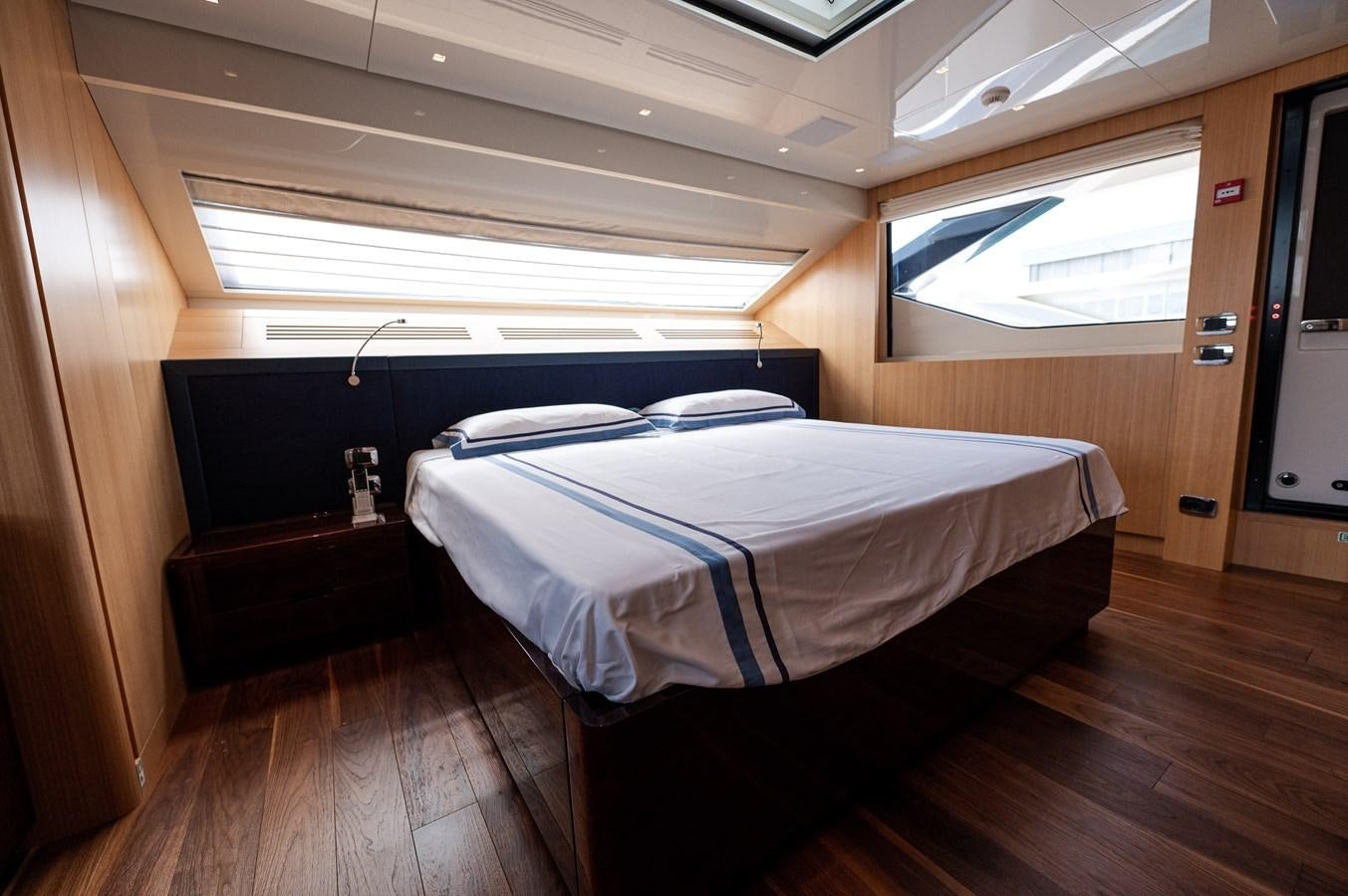 a room with two beds aboard VISSOTTA Yacht for Sale