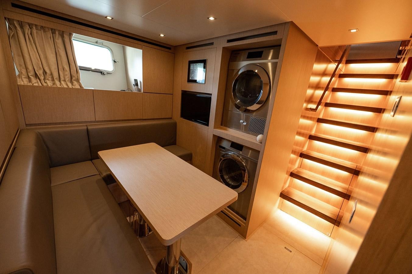 a room with a bed and a television aboard VISSOTTA Yacht for Sale