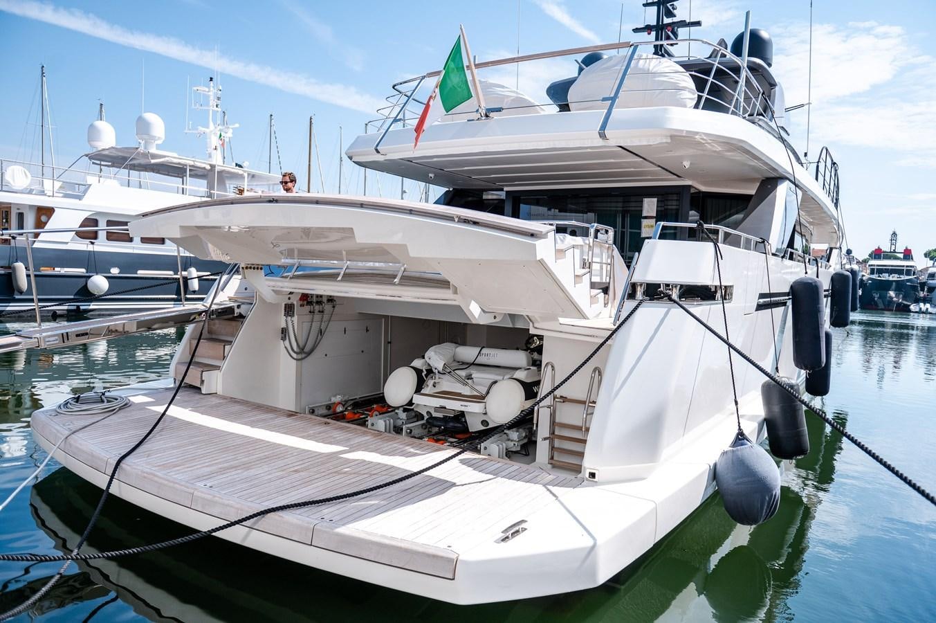 a boat docked at a pier aboard VISSOTTA Yacht for Sale