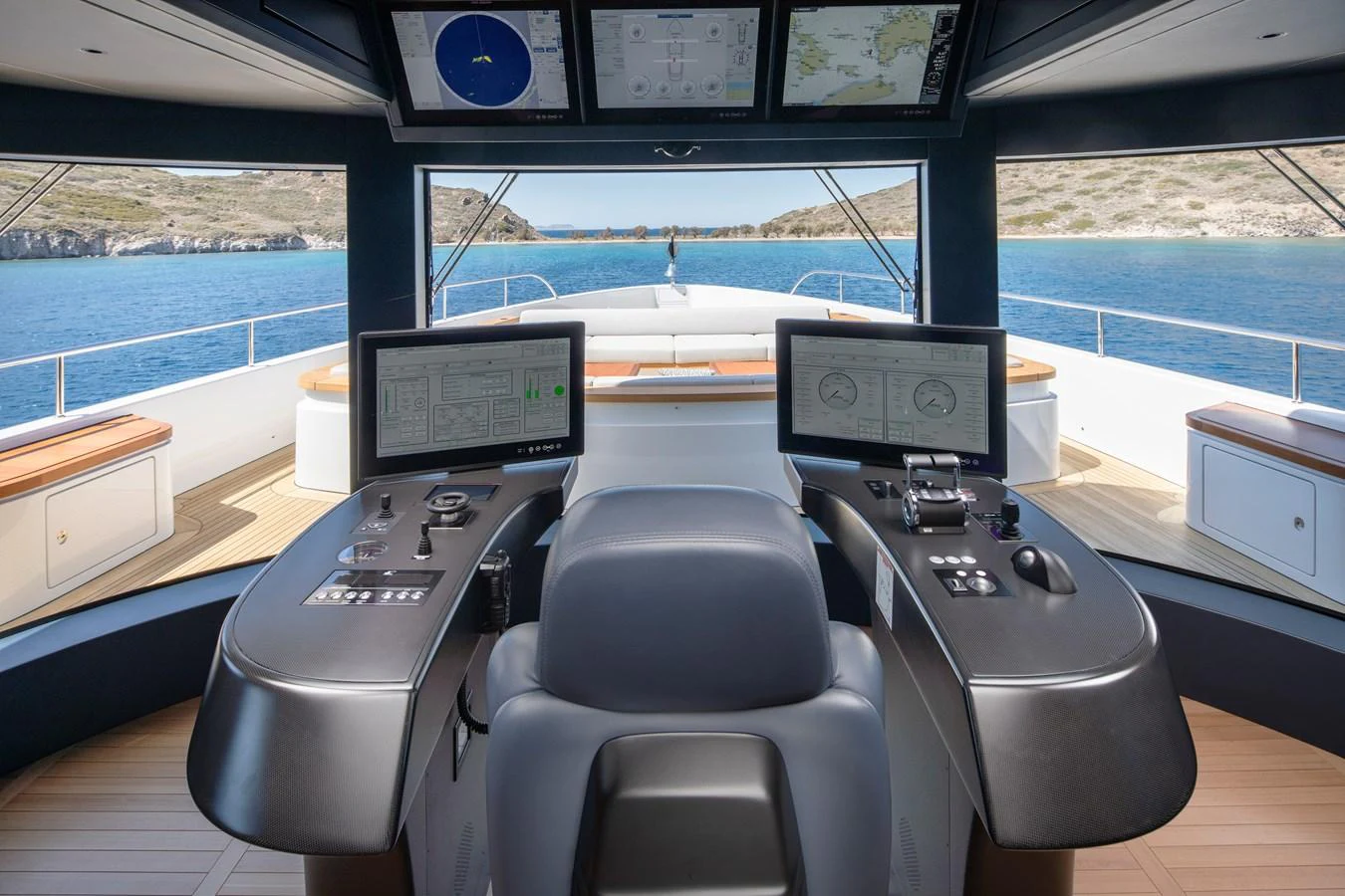 a room with a desk and computer aboard LEXSEA Yacht for Sale