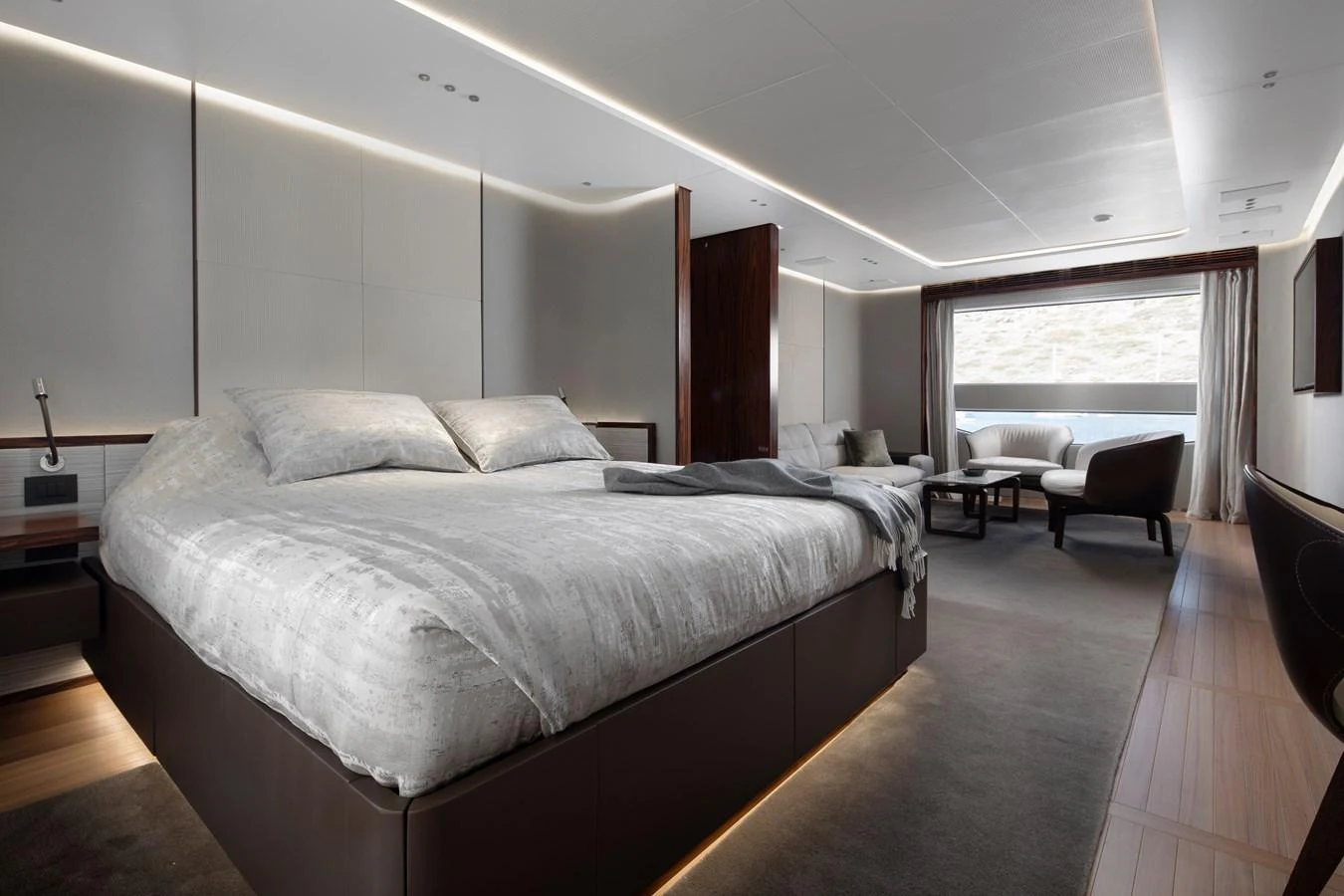 a bedroom with a large bed aboard LEXSEA Yacht for Sale