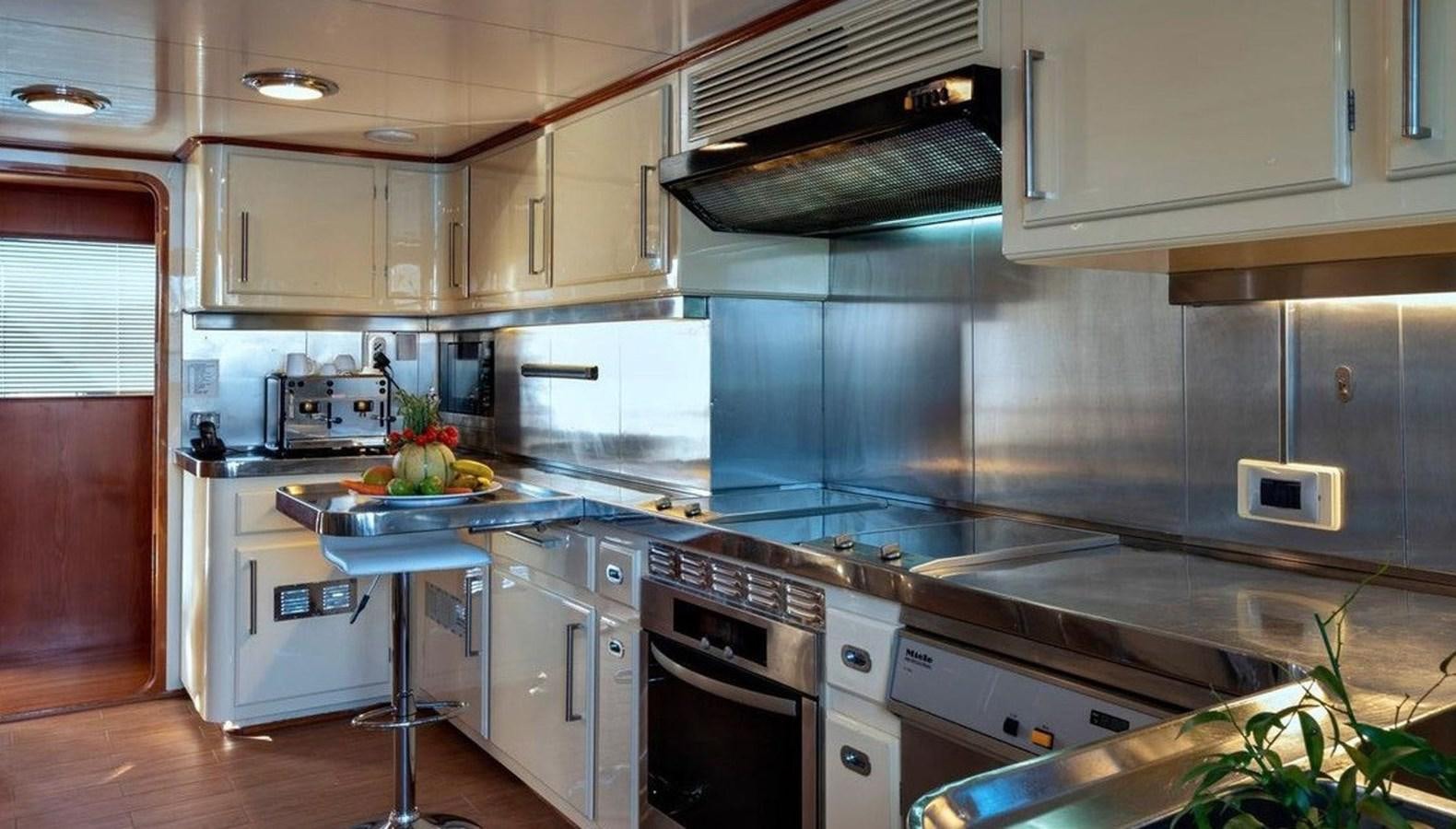 a kitchen with a large island aboard NIGHTFLOWER Yacht for Sale