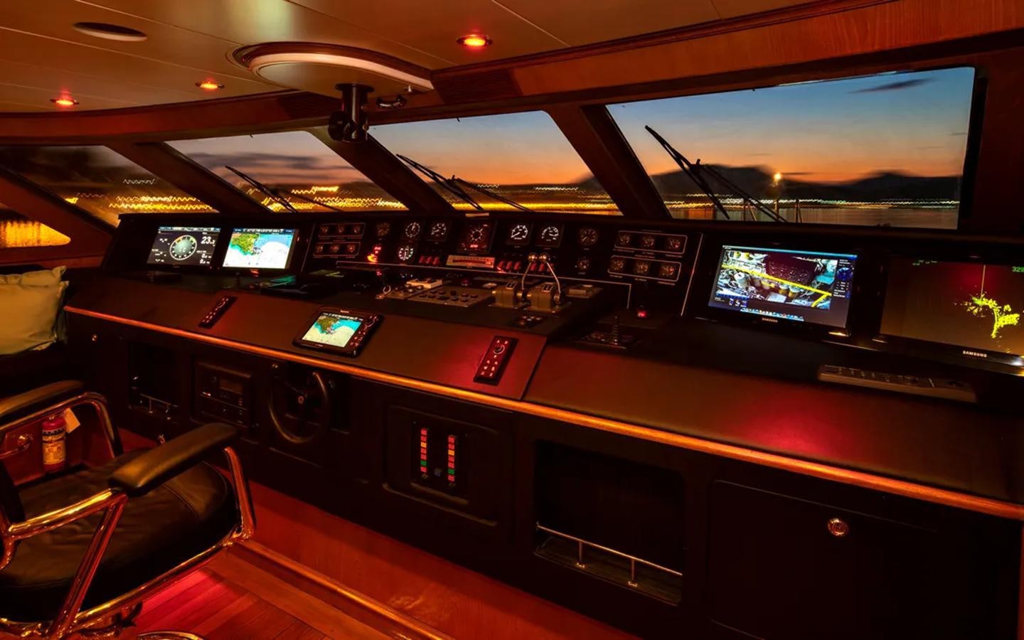 a control panel with many screens aboard NIGHTFLOWER Yacht for Sale