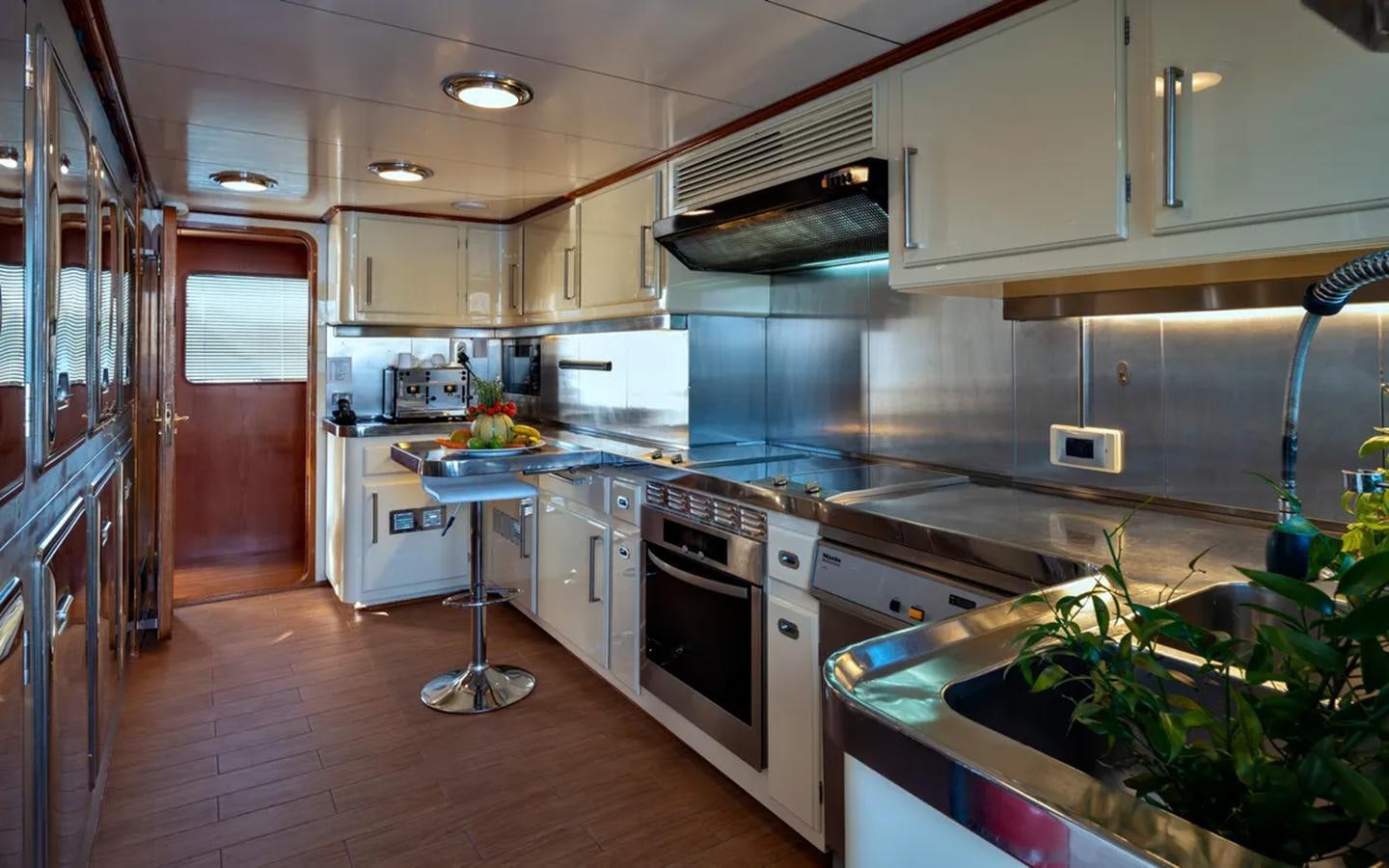 a kitchen with a large island aboard NIGHTFLOWER Yacht for Sale