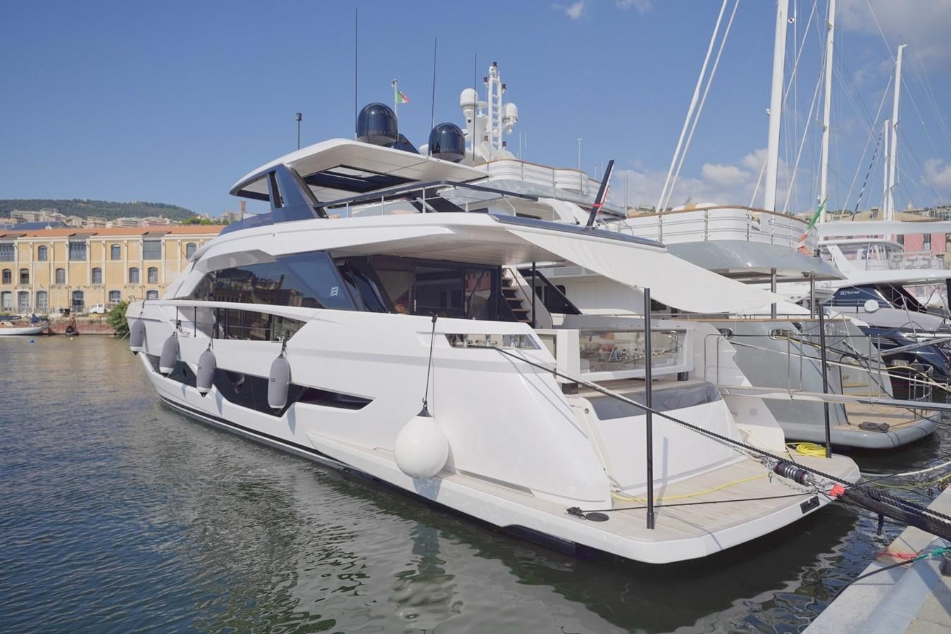 a white yacht docked aboard ASMARA Yacht for Sale