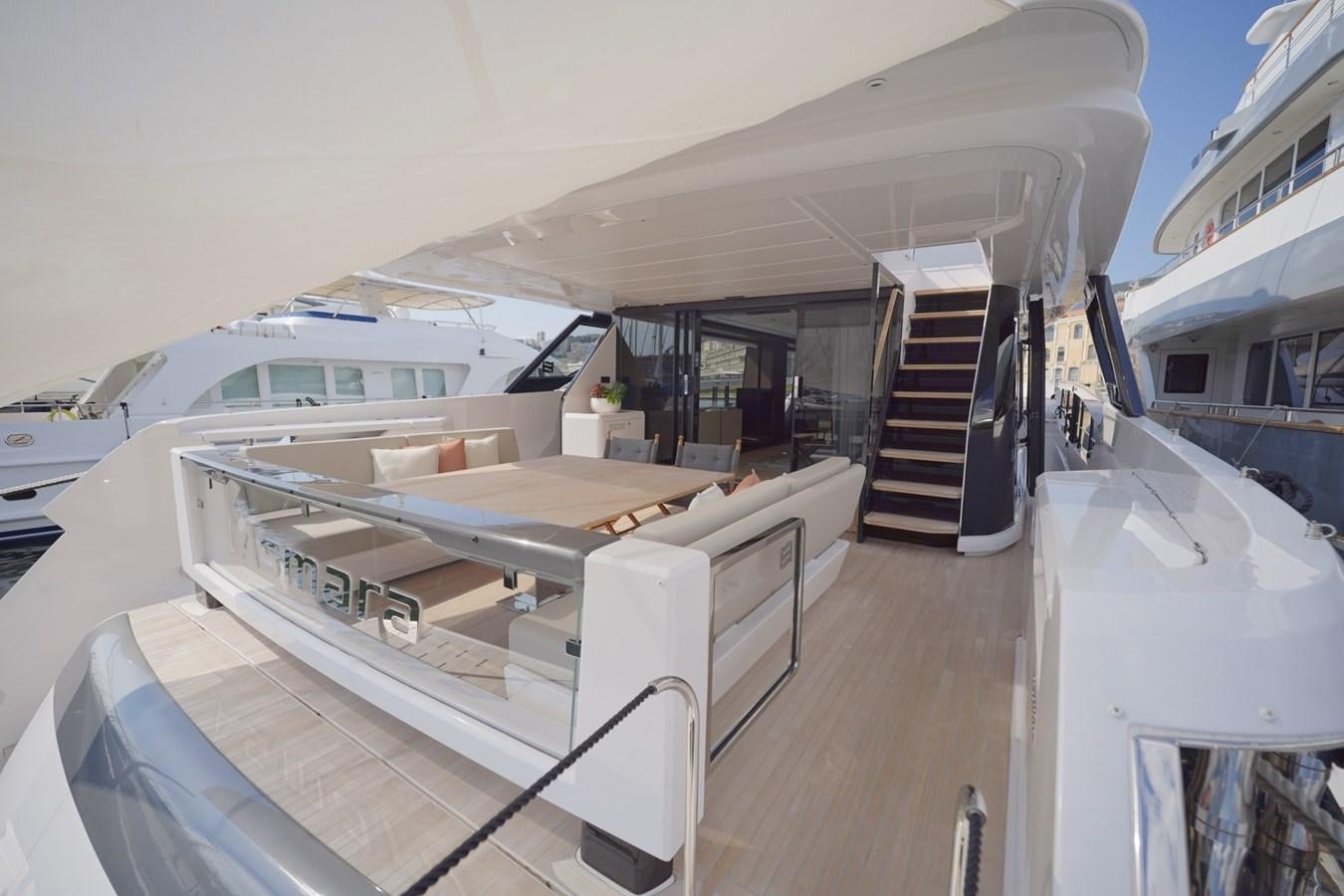 a room with a row of white yachts aboard ASMARA Yacht for Sale