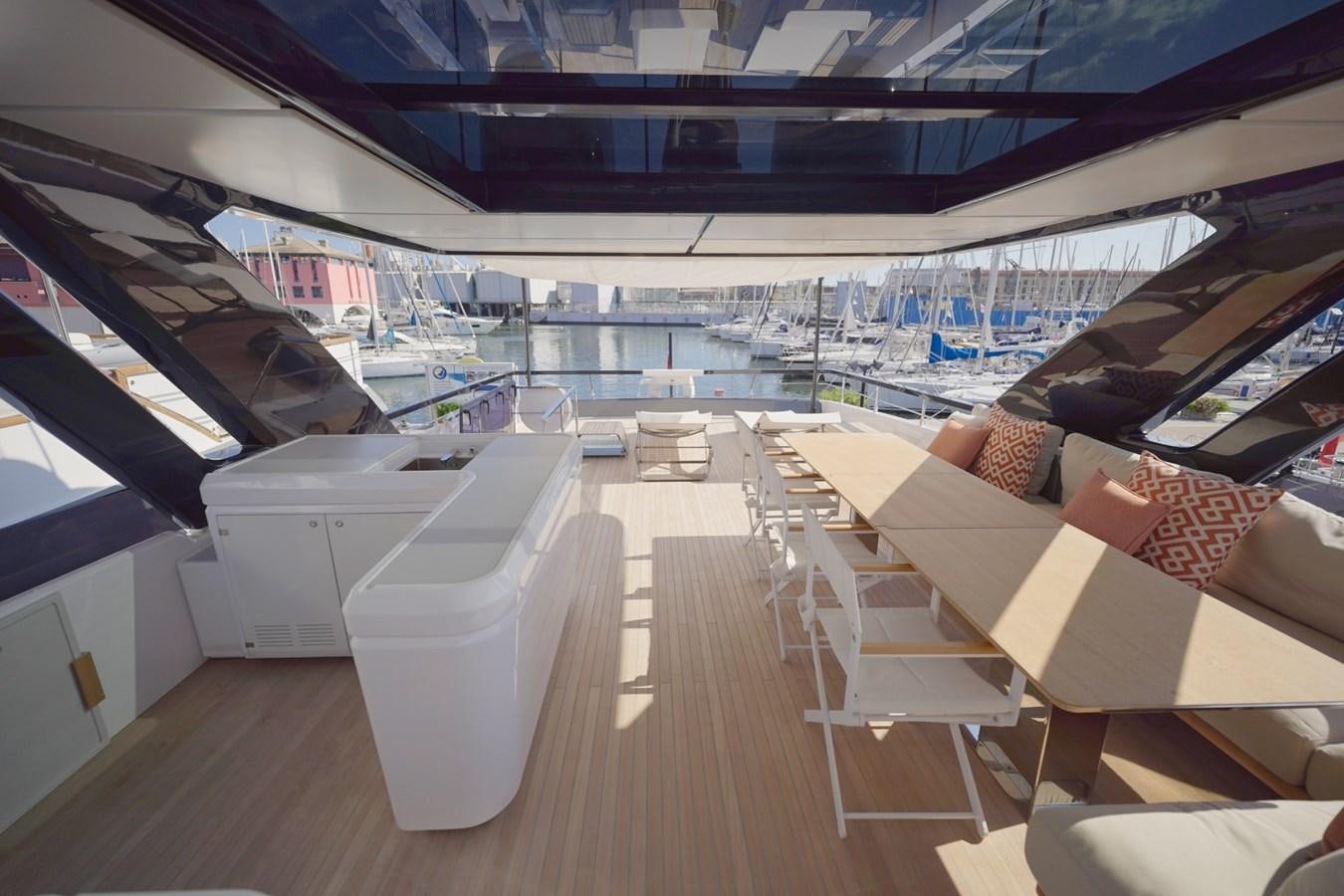 a room with a view of the water and the deck aboard ASMARA Yacht for Sale