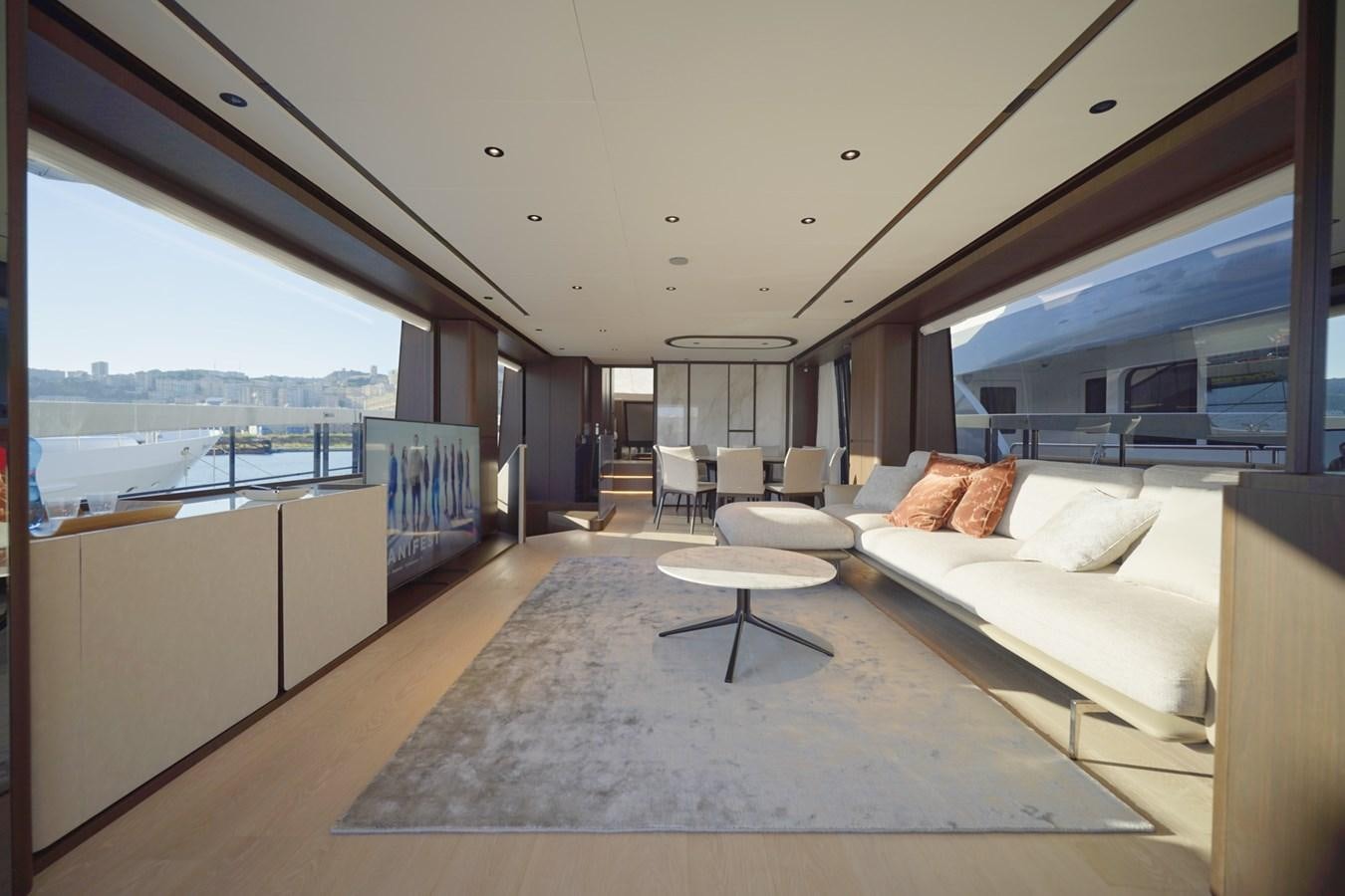 a large living room with a large balcony aboard ASMARA Yacht for Sale