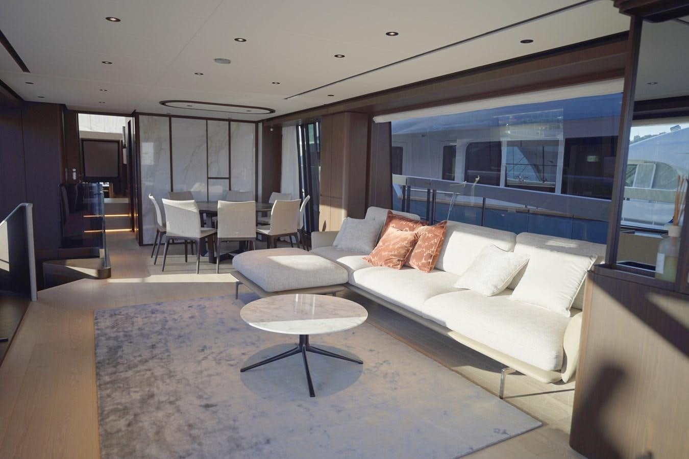 a living room with a large window aboard ASMARA Yacht for Sale