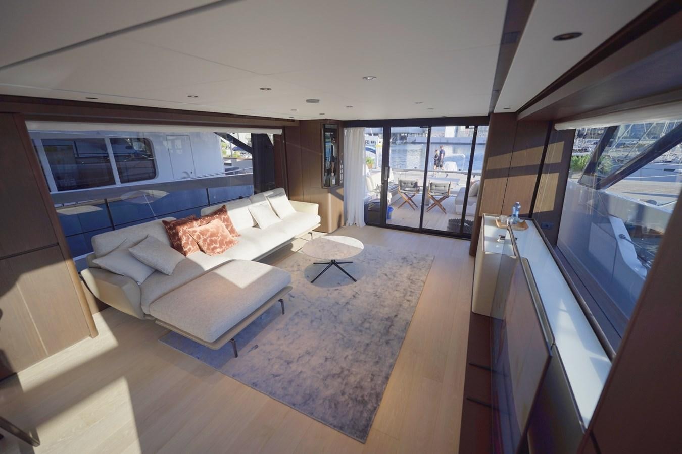 a living room with a large window aboard ASMARA Yacht for Sale