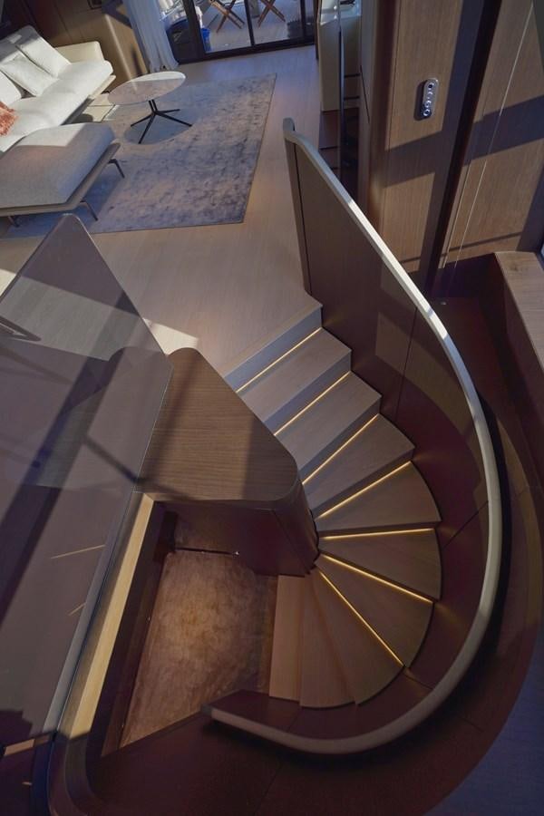 a wooden piano in a room aboard ASMARA Yacht for Sale