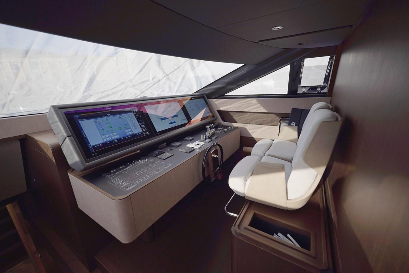 a desk with a computer and a chair aboard ASMARA Yacht for Sale
