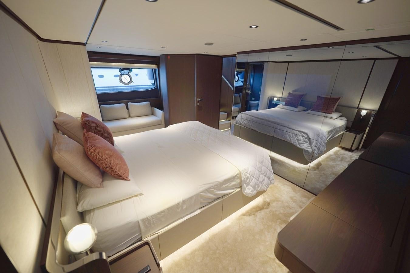 a room with two beds aboard ASMARA Yacht for Sale