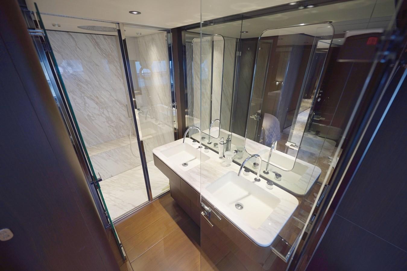 a bathroom with a large mirror aboard ASMARA Yacht for Sale
