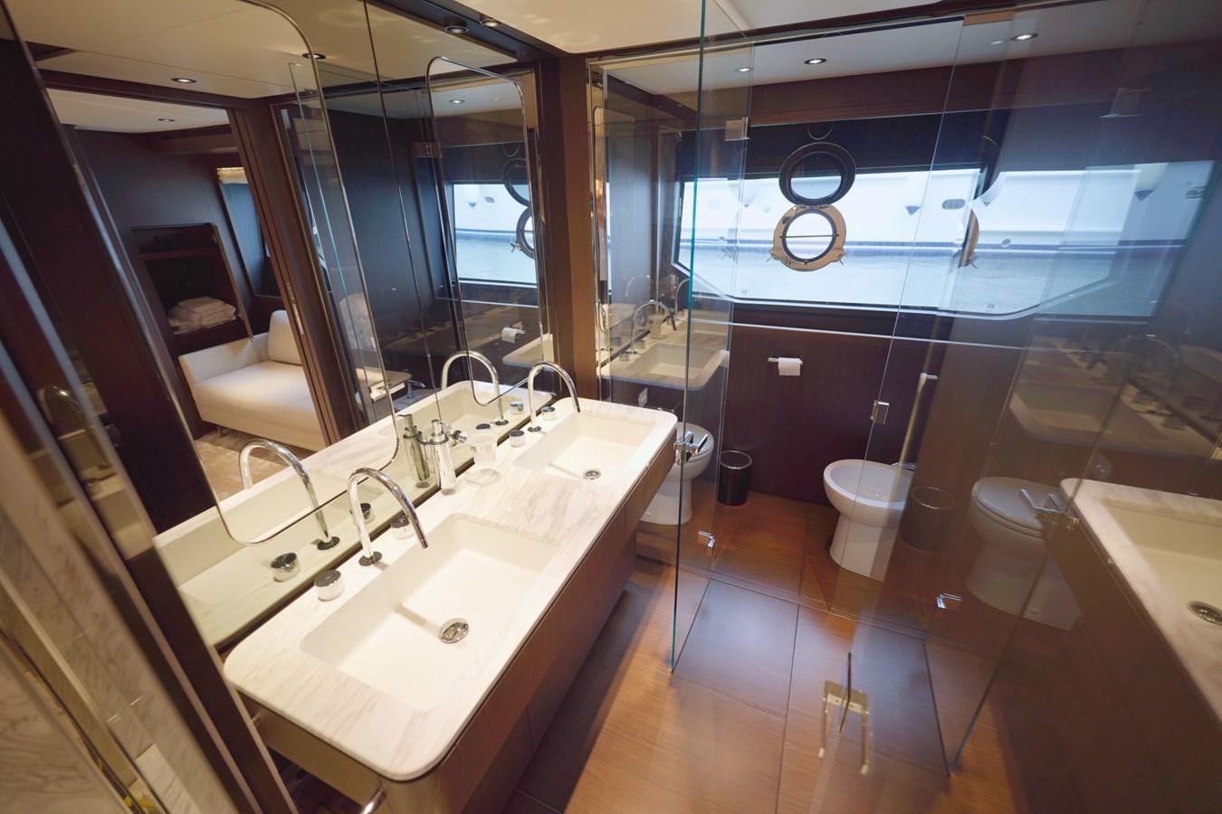 a bathroom with a large mirror aboard ASMARA Yacht for Sale