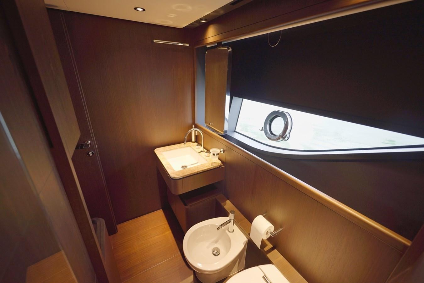 a bathroom with a sink and a mirror aboard ASMARA Yacht for Sale