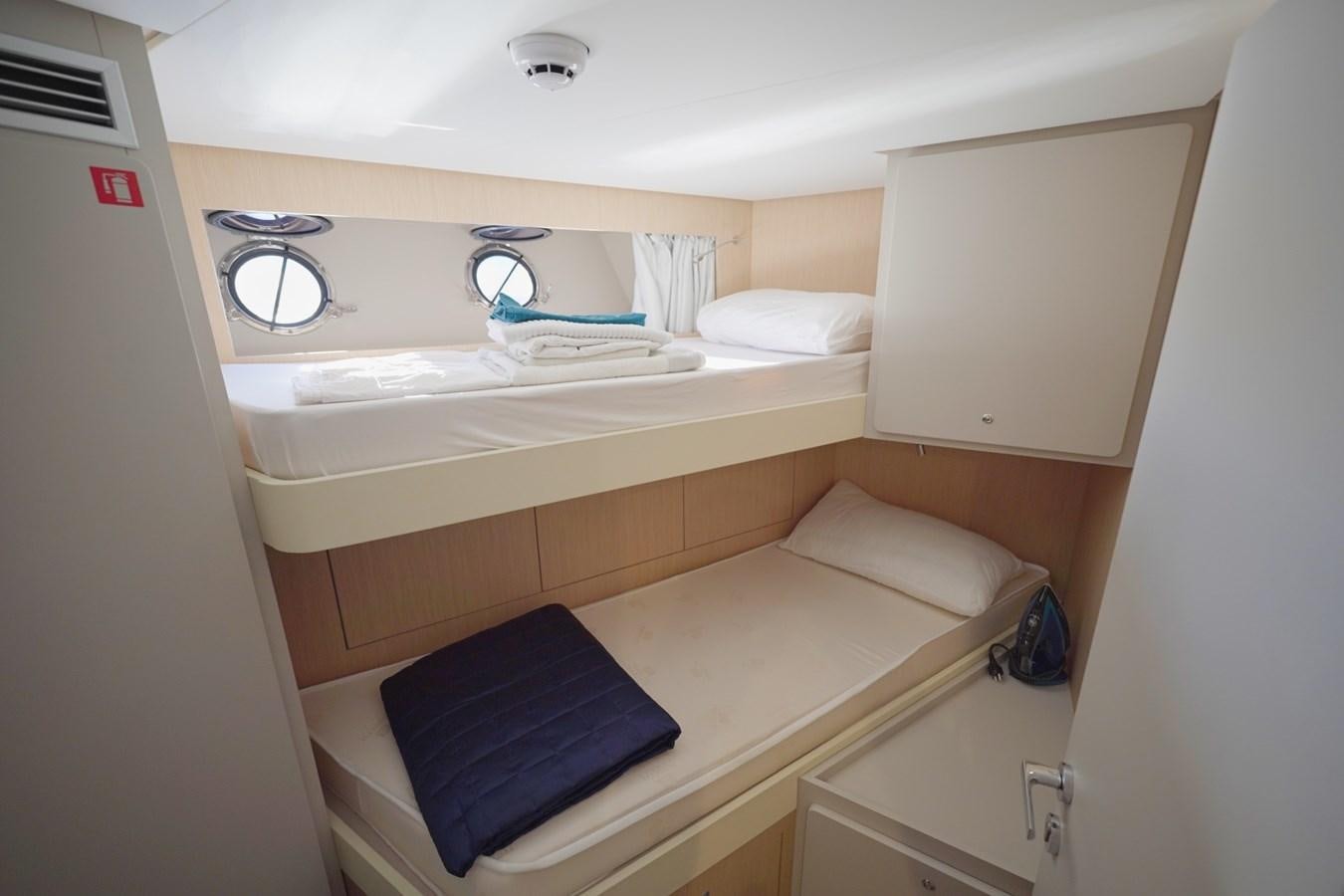 a bed in a room aboard ASMARA Yacht for Sale