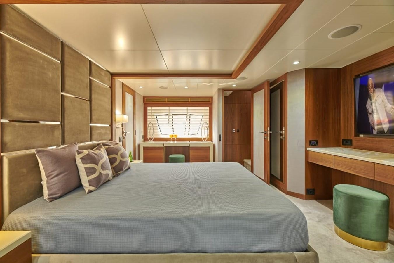 a bed in a room aboard LA FENICE Yacht for Sale