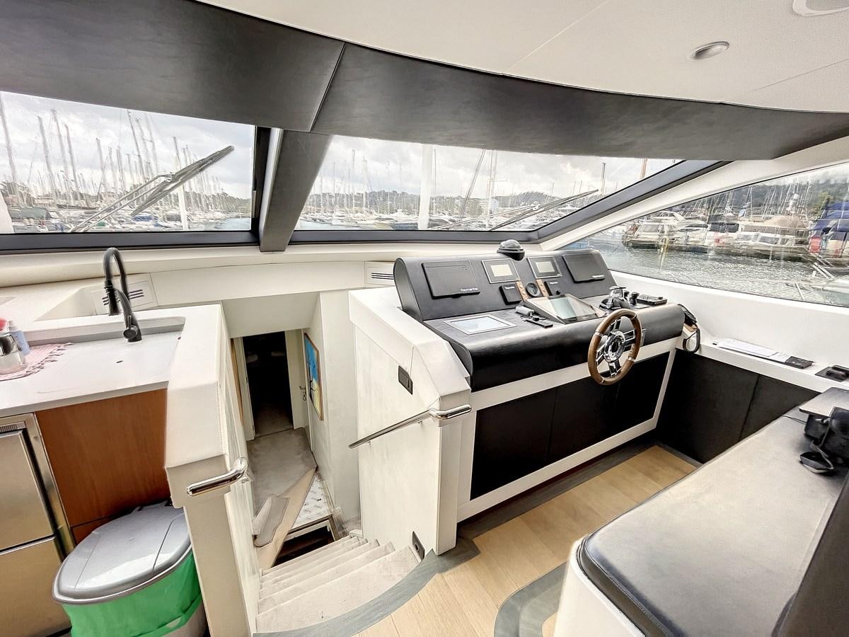 a boat with a large deck aboard LA FENICE Yacht for Sale