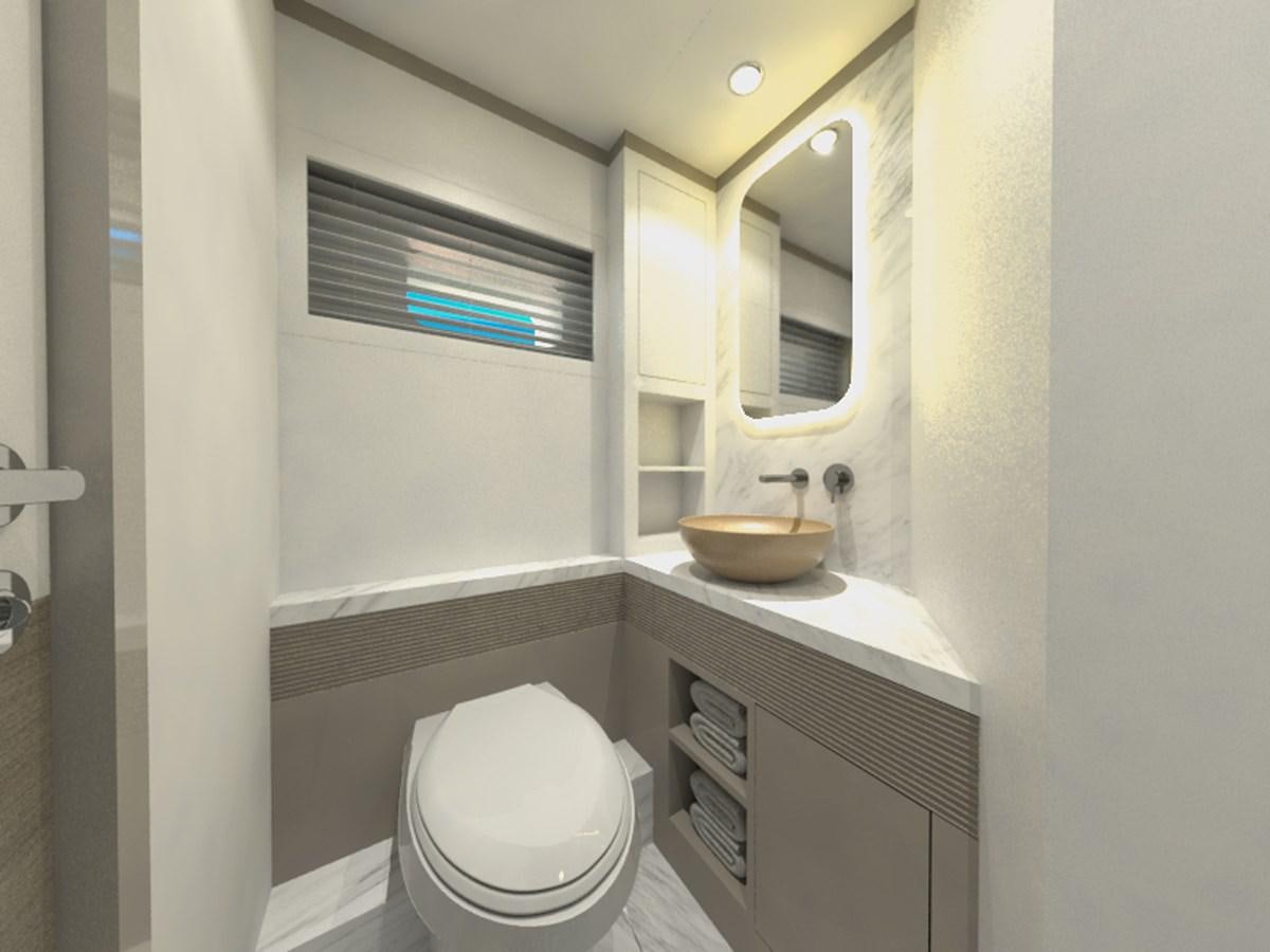 a bathroom with a toilet and a sink aboard VOYAGE ONE Yacht for Sale