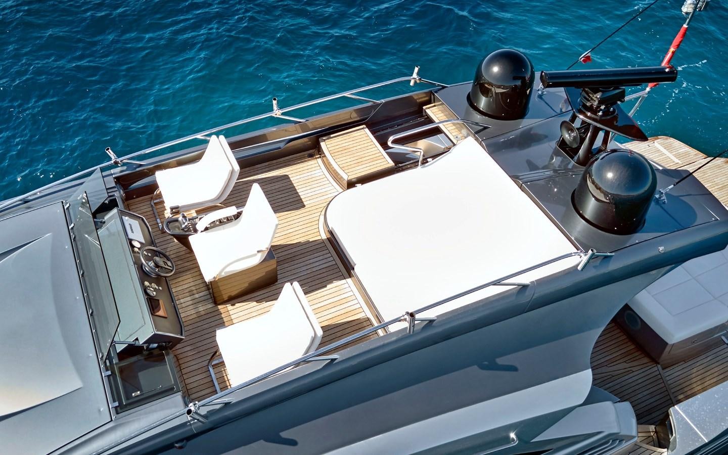 a boat with a steering wheel aboard UPTOWN GIRL Yacht for Sale