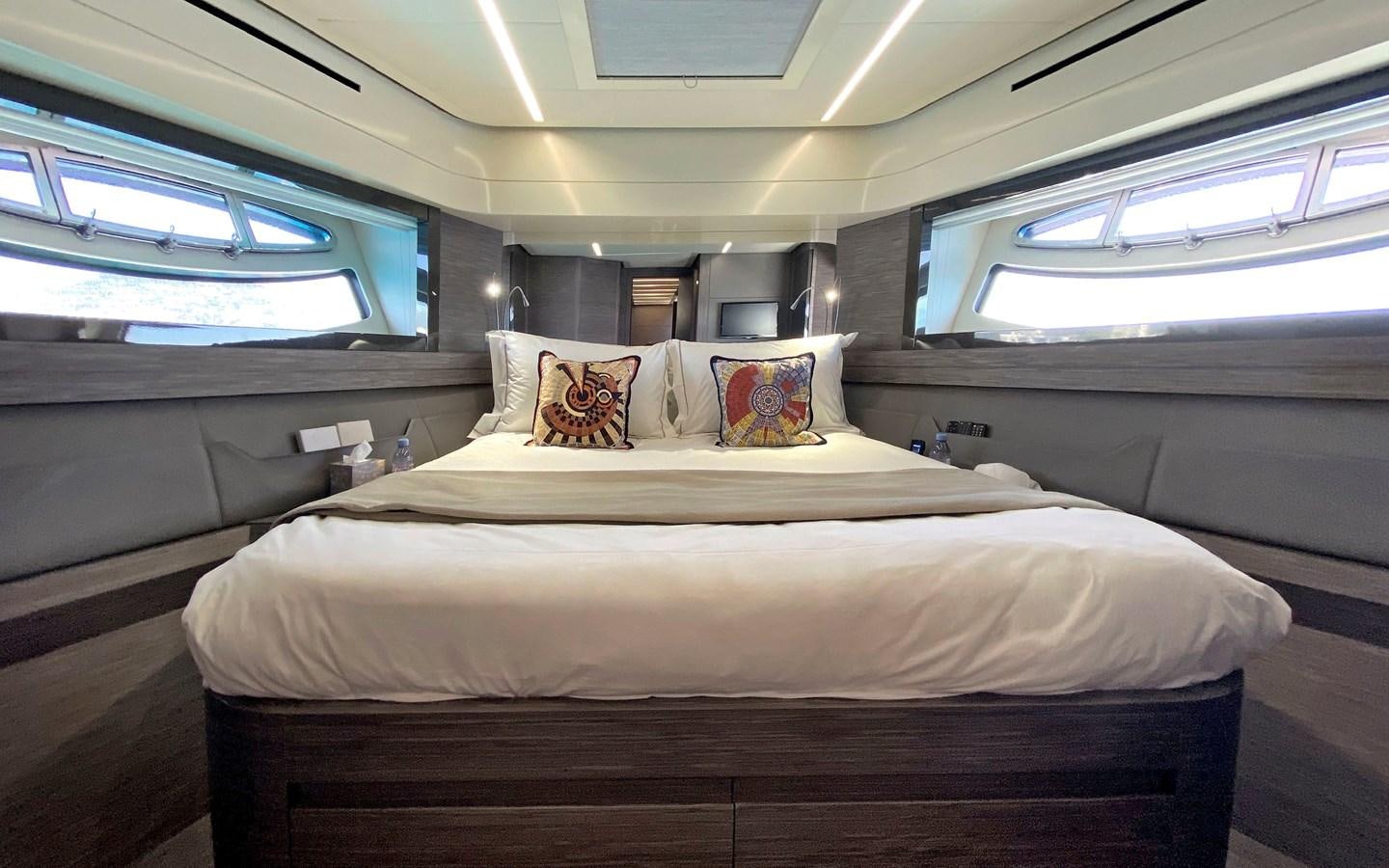 a bed in a room aboard UPTOWN GIRL Yacht for Sale