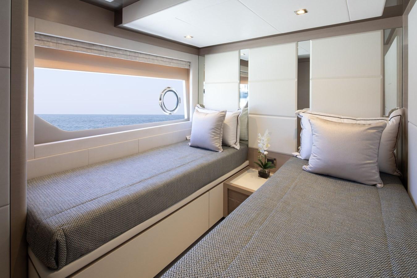 a room with two beds aboard OCEAN ALEXANDER 27R06 Yacht for Sale
