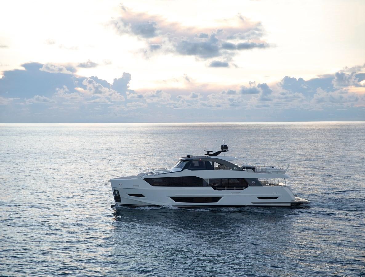 a white yacht in the water aboard OCEAN ALEXANDER 27R06 Yacht for Sale