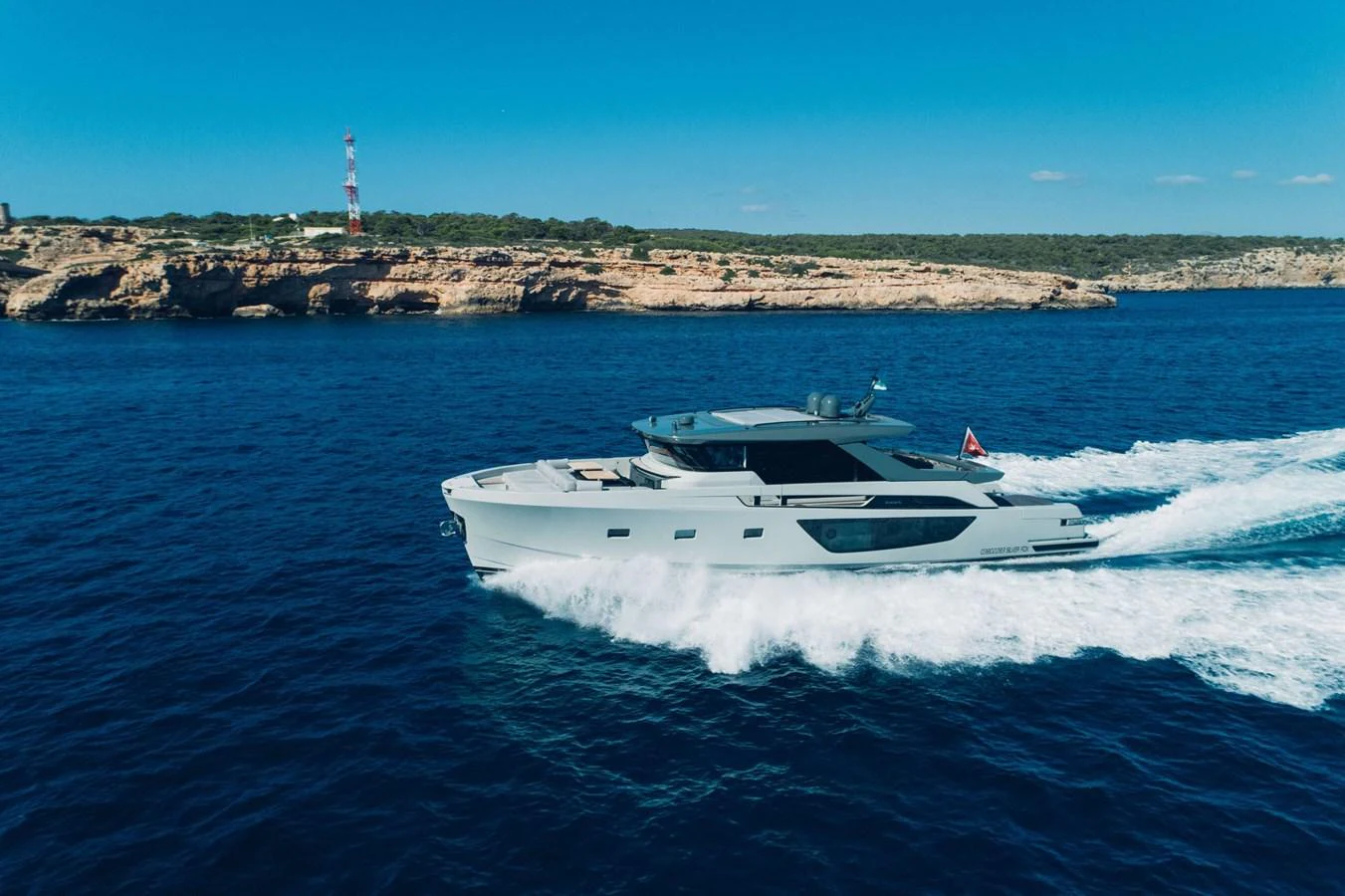 a boat on the water aboard 2020 BLUEGAME BGX70 #02 Yacht for Sale