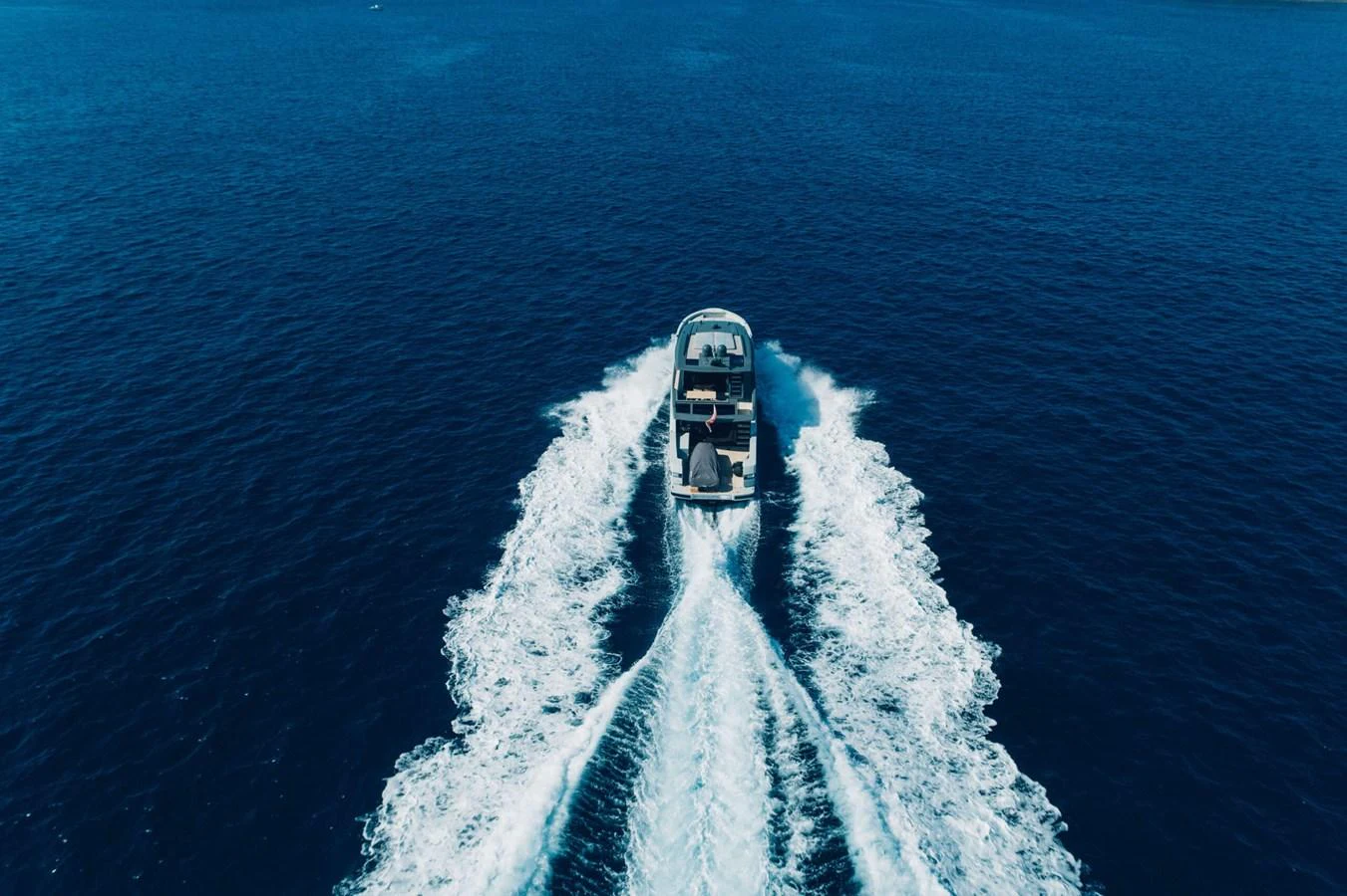 a boat in the water aboard 2020 BLUEGAME BGX70 #02 Yacht for Sale