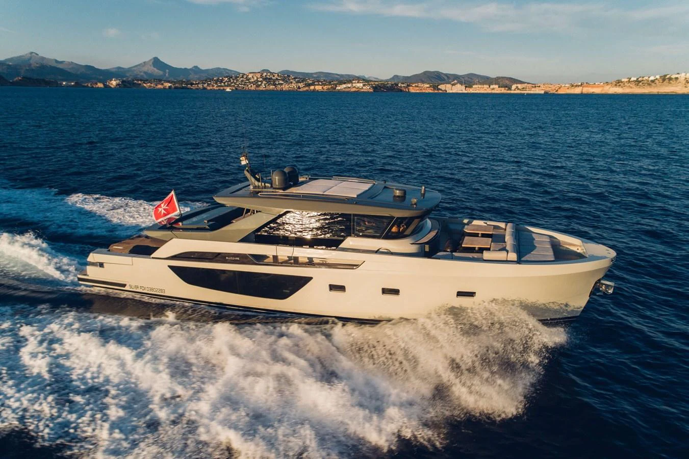 a boat on the water aboard 2020 BLUEGAME BGX70 #02 Yacht for Sale