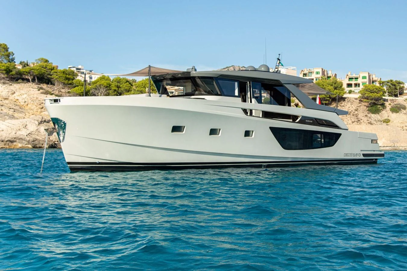 a boat on the water aboard 2020 BLUEGAME BGX70 #02 Yacht for Sale