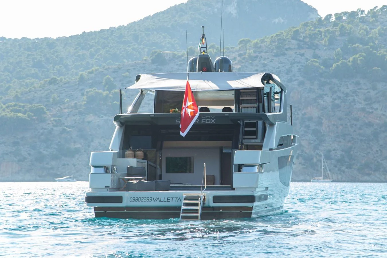 a boat on the water aboard 2020 BLUEGAME BGX70 #02 Yacht for Sale