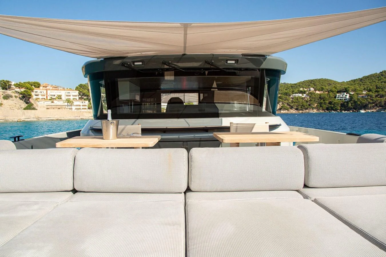a couch on a boat aboard 2020 BLUEGAME BGX70 #02 Yacht for Sale